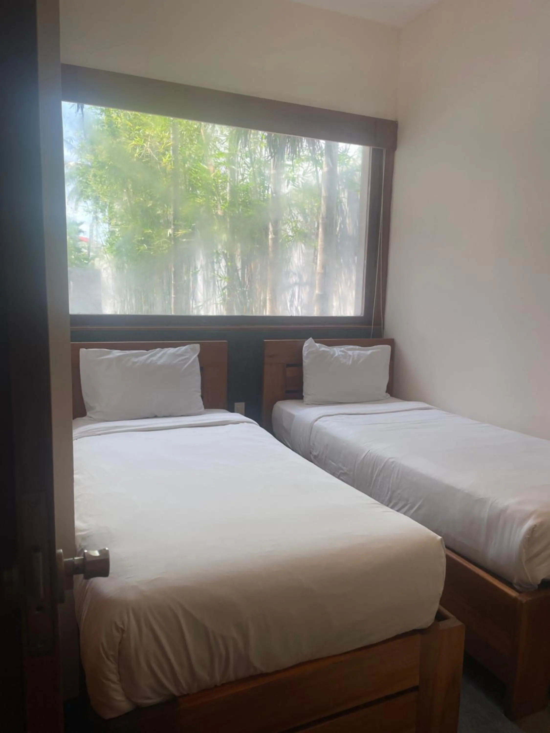 Bed in Palm View Villa