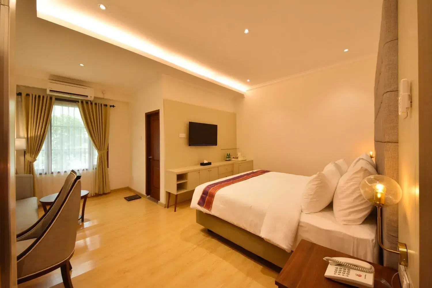 Bed in KHAS Ombilin Hotel Bed in KHAS Ombilin Hotel