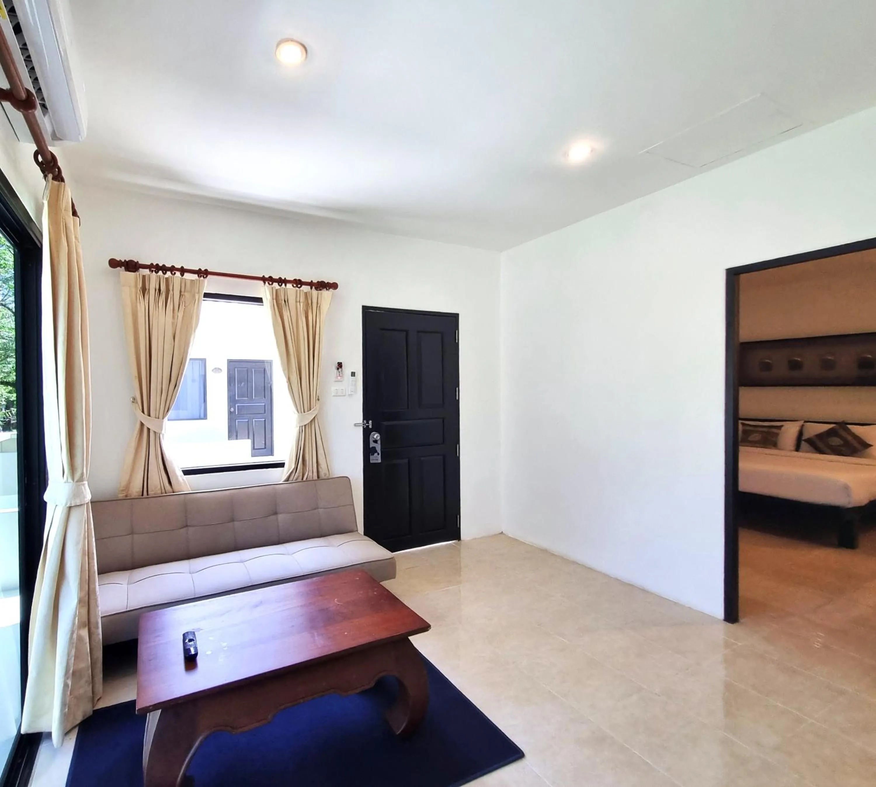 Living room, Bed in Isara Nai Yang resort