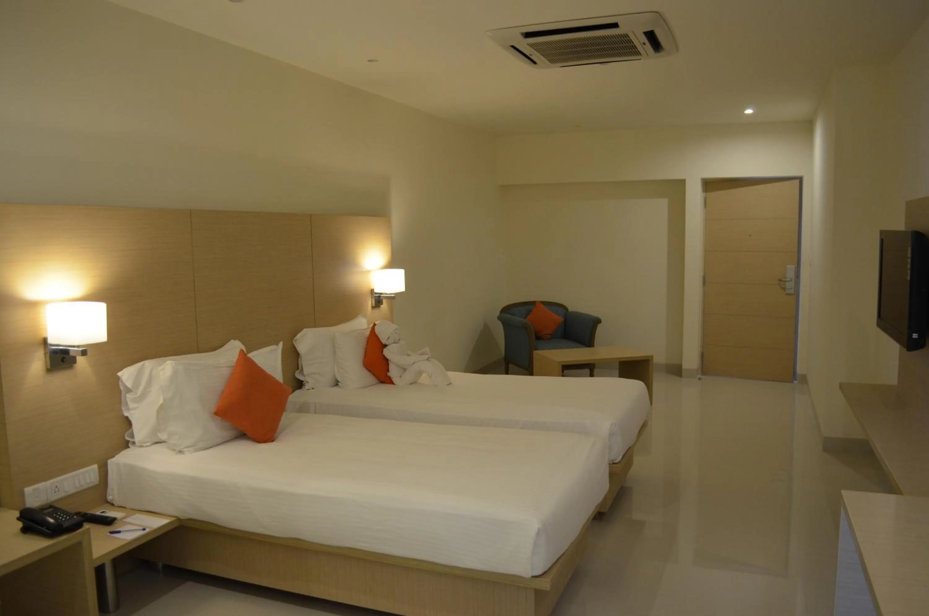 Photo of the whole room, Bed in Regency Tiruttani by GRT Hotels