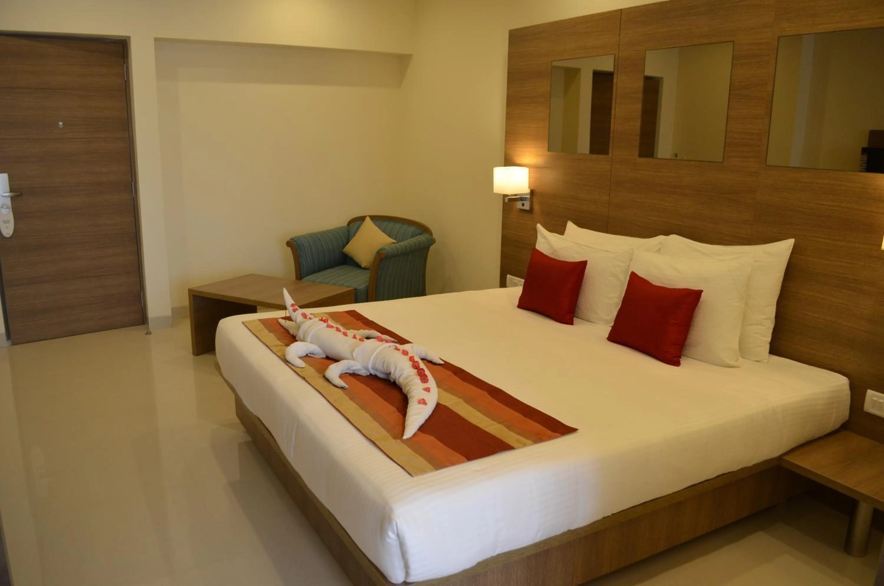 Photo of the whole room, Bed in Regency Tiruttani by GRT Hotels
