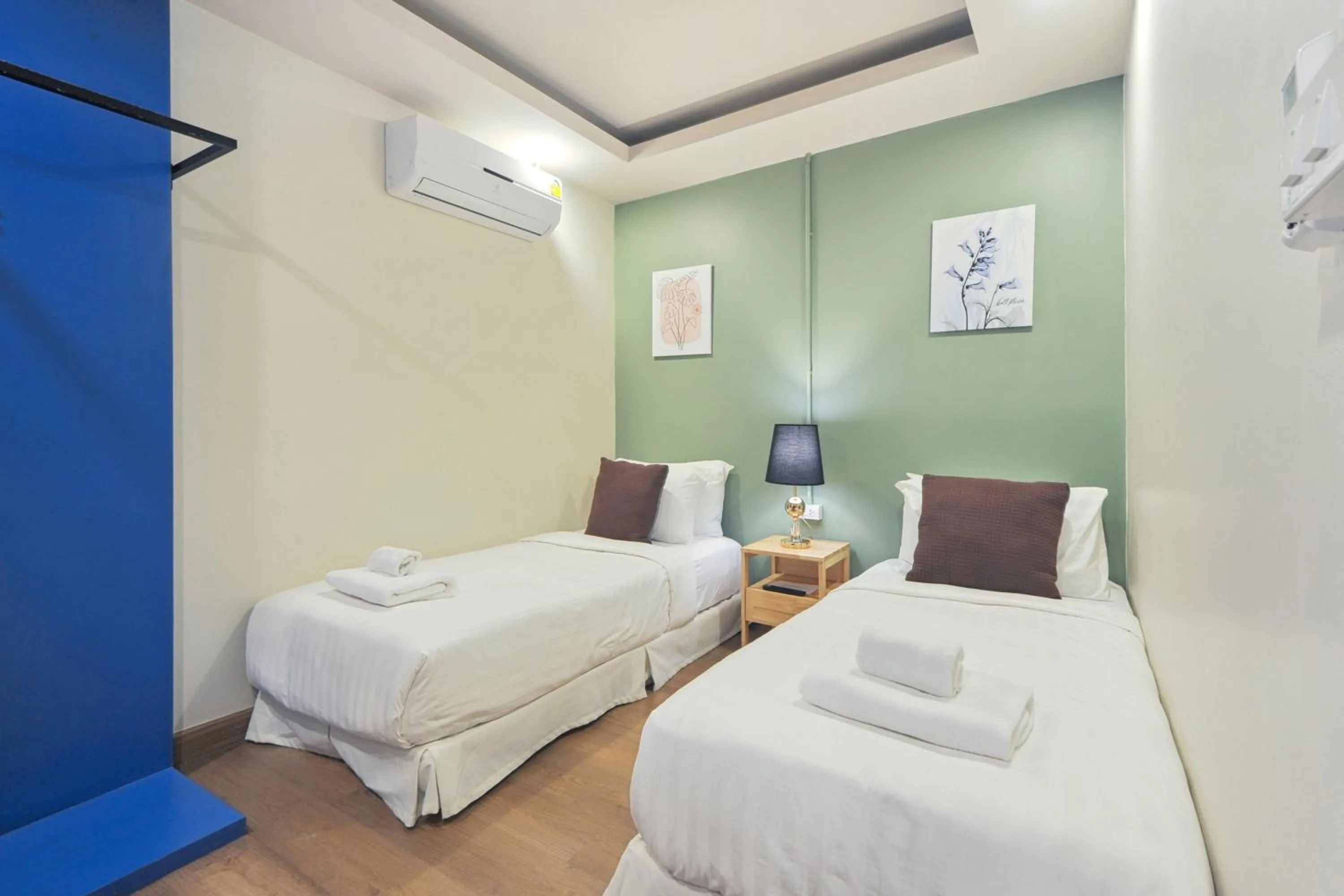 Bed in Ployburi Boutique Hotel