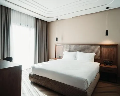 Bed in City Hotel by Waves