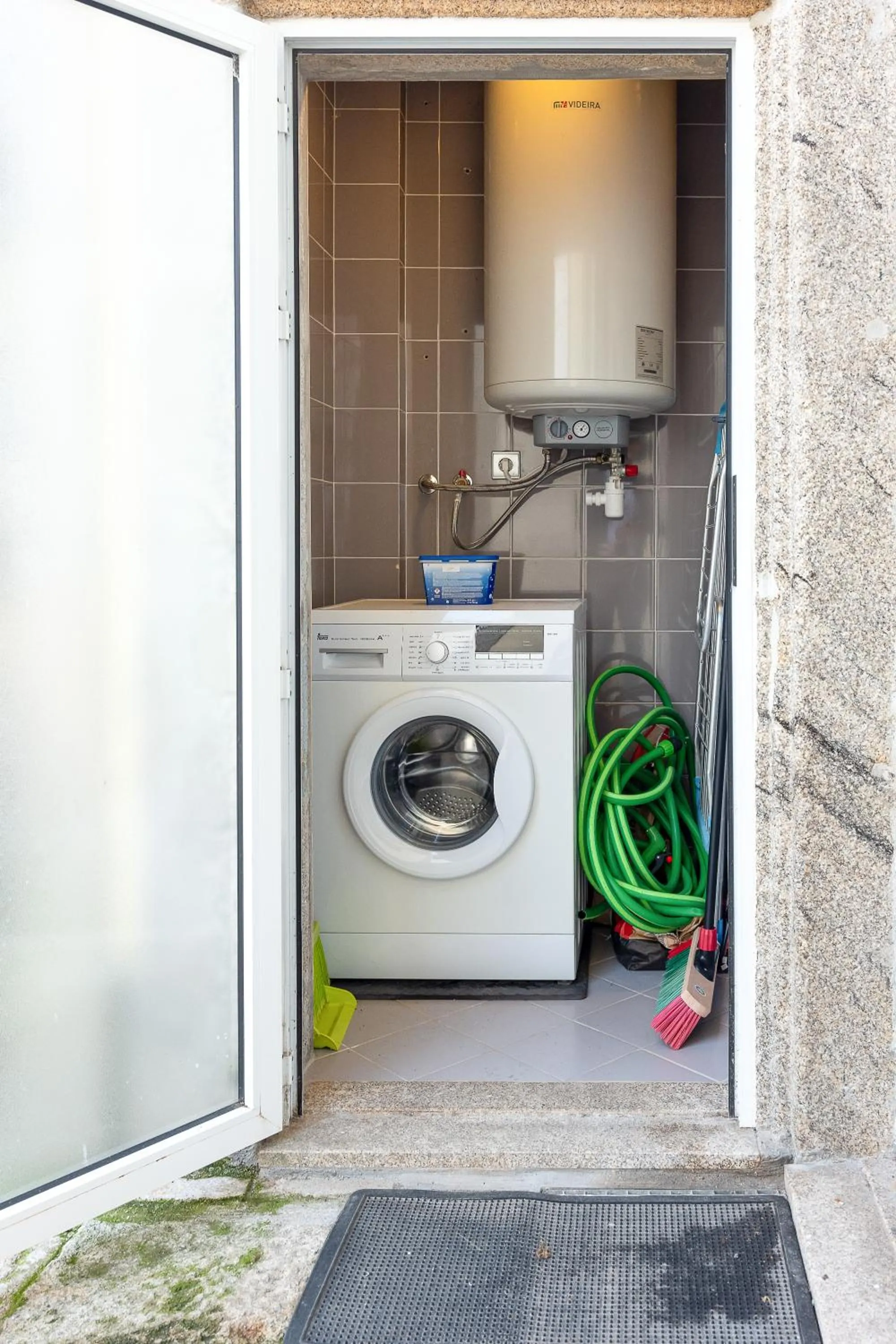 washing machine in Oporto Trendy Apartments