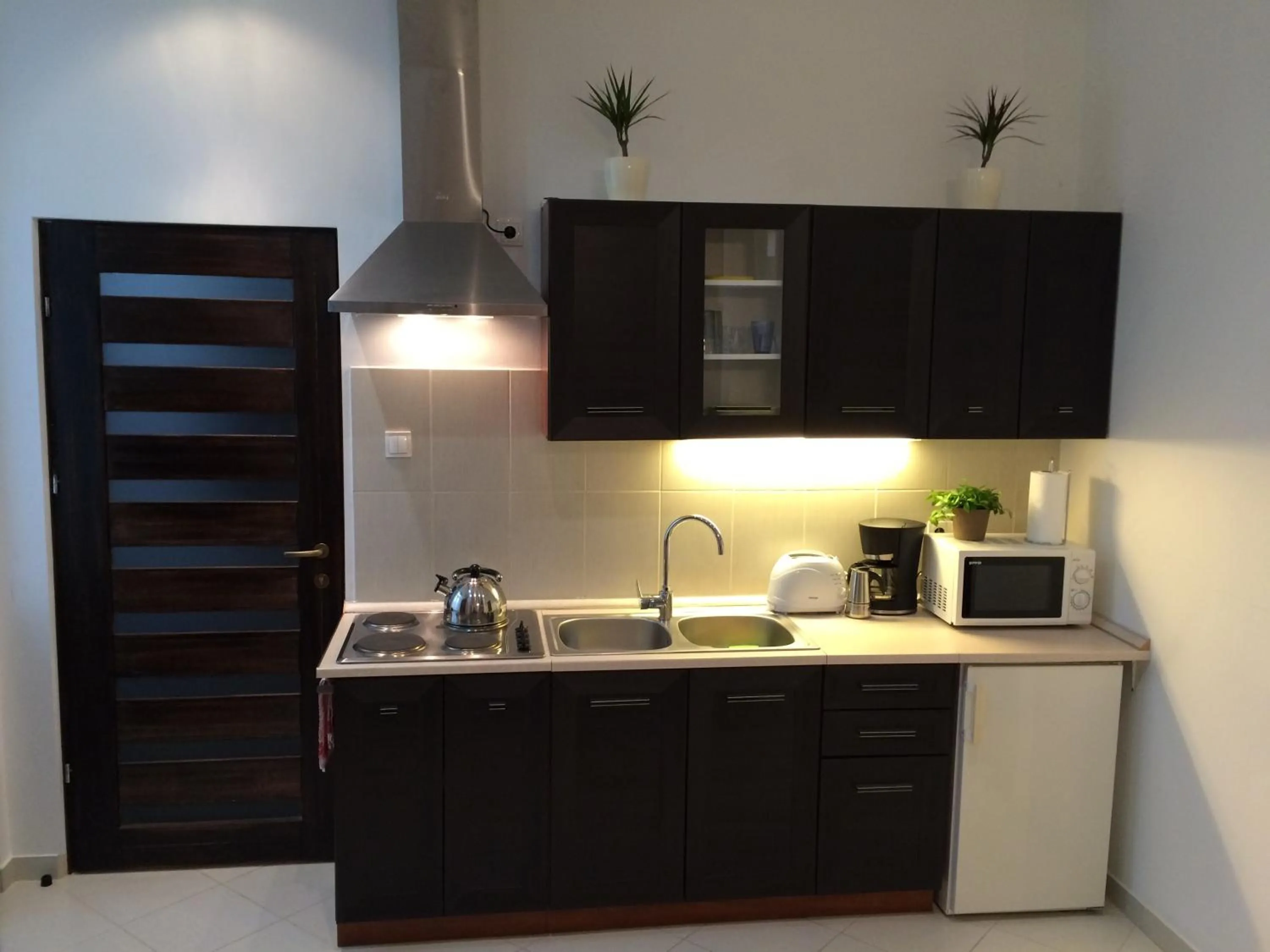 Kitchen or kitchenette in Central King Apartment