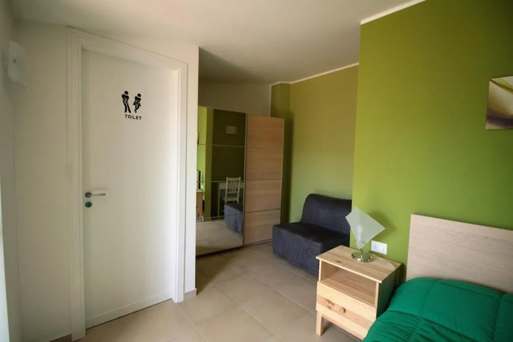 Photo of the whole room in La Rosatea Rooms