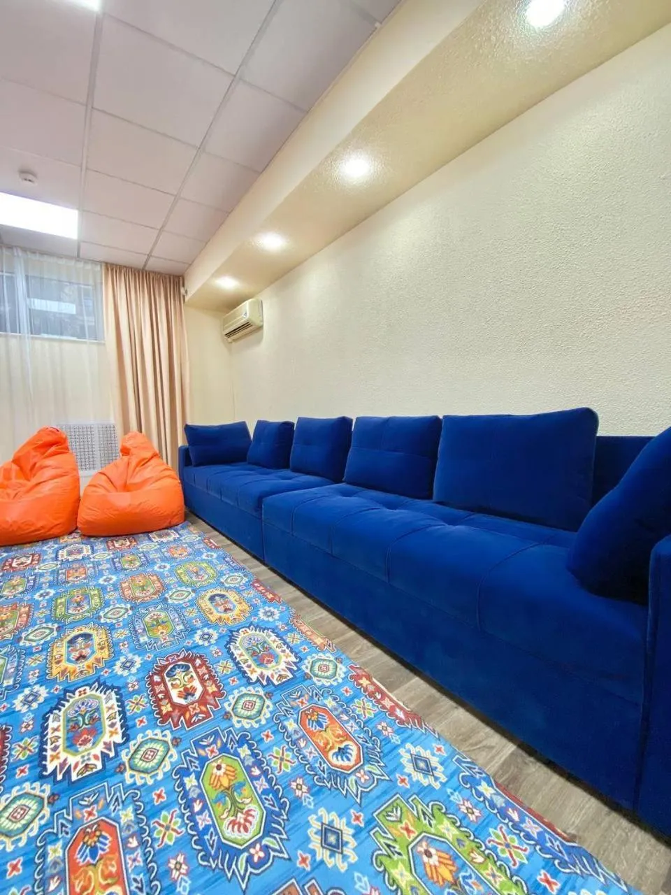 Communal lounge/ TV room, Bed in Alma-Ata Hostel