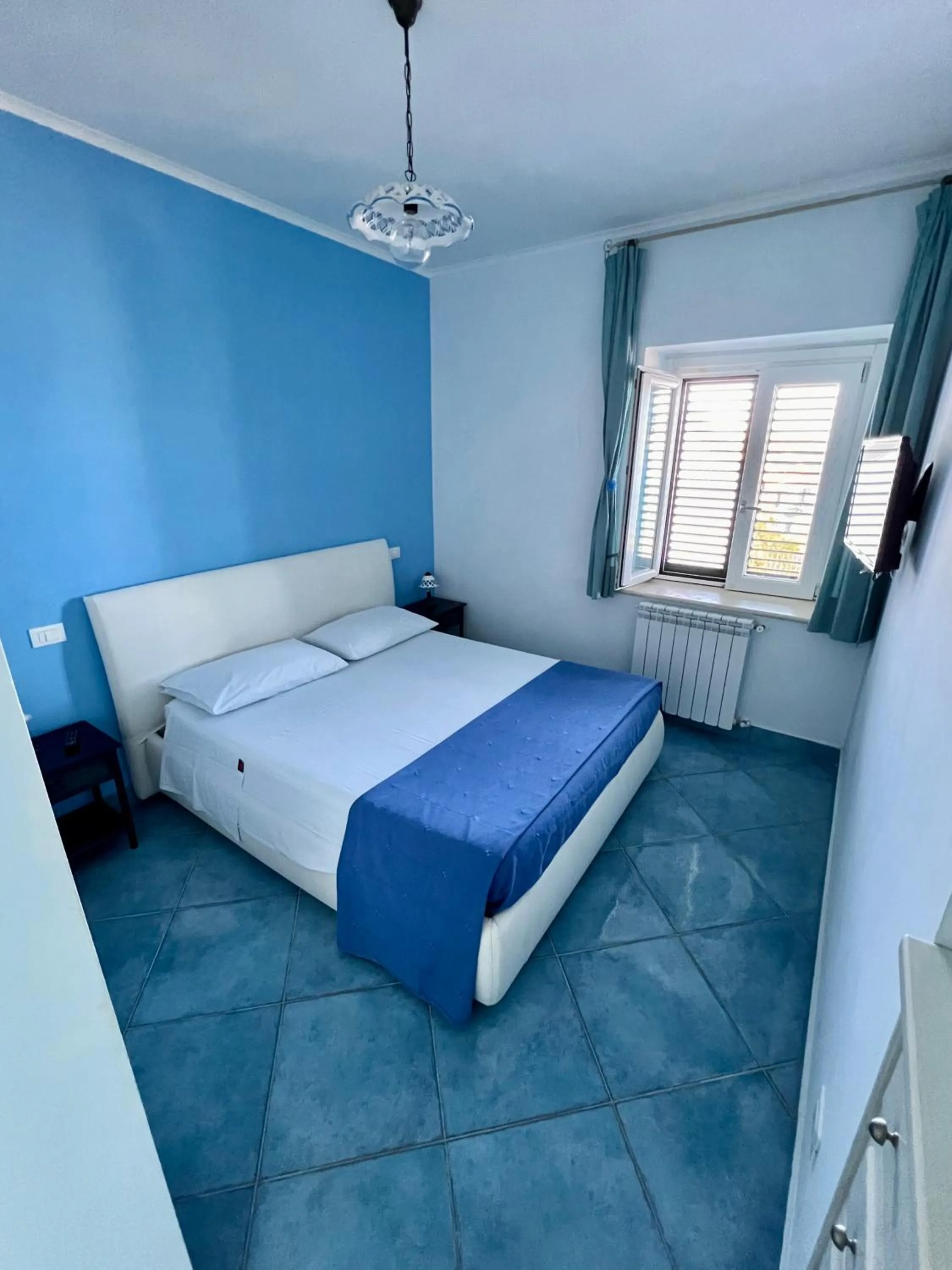 View (from property/room), Bed in Bella Tropea Suite