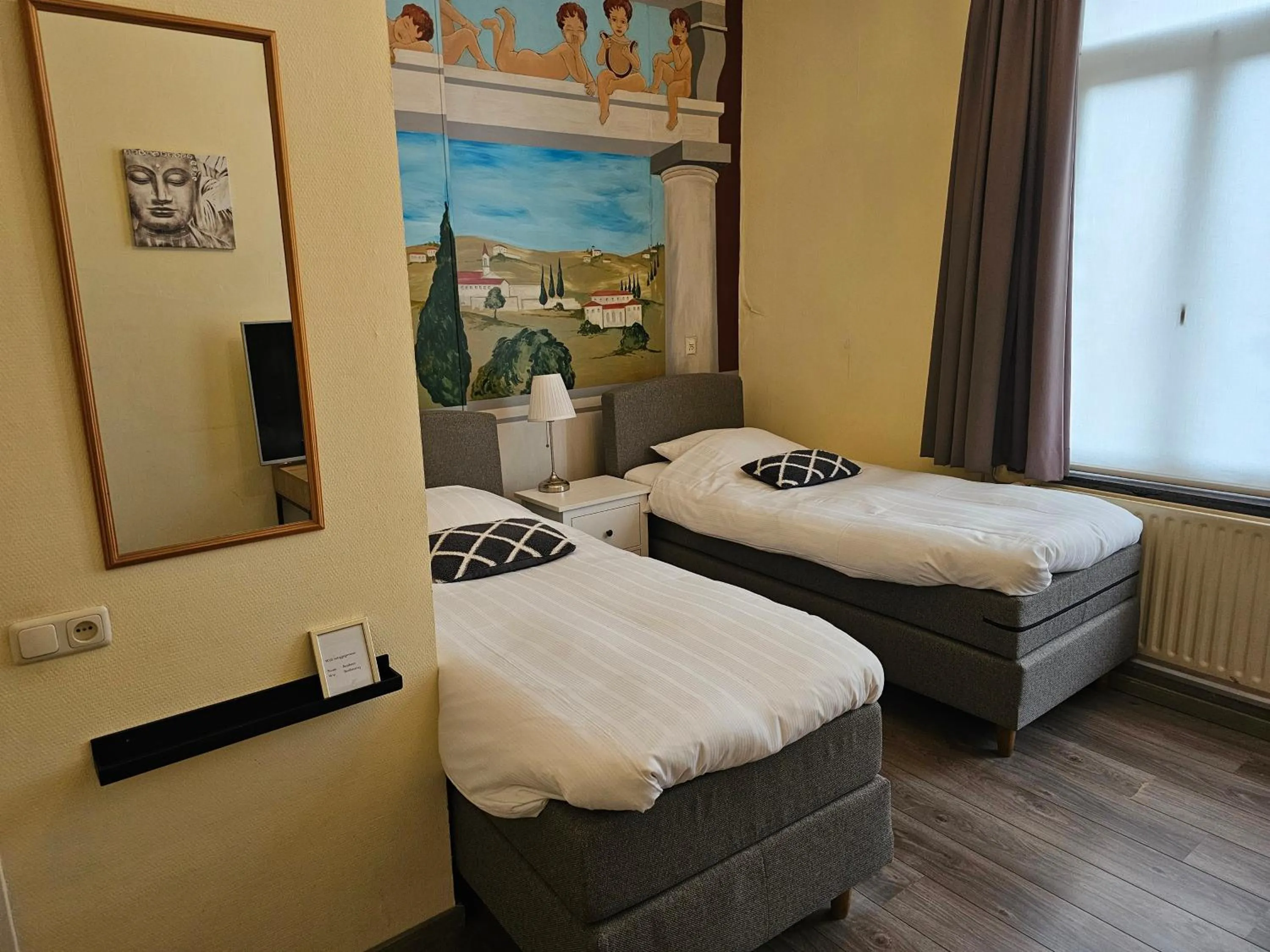 Bed in Hotel le Bonheur