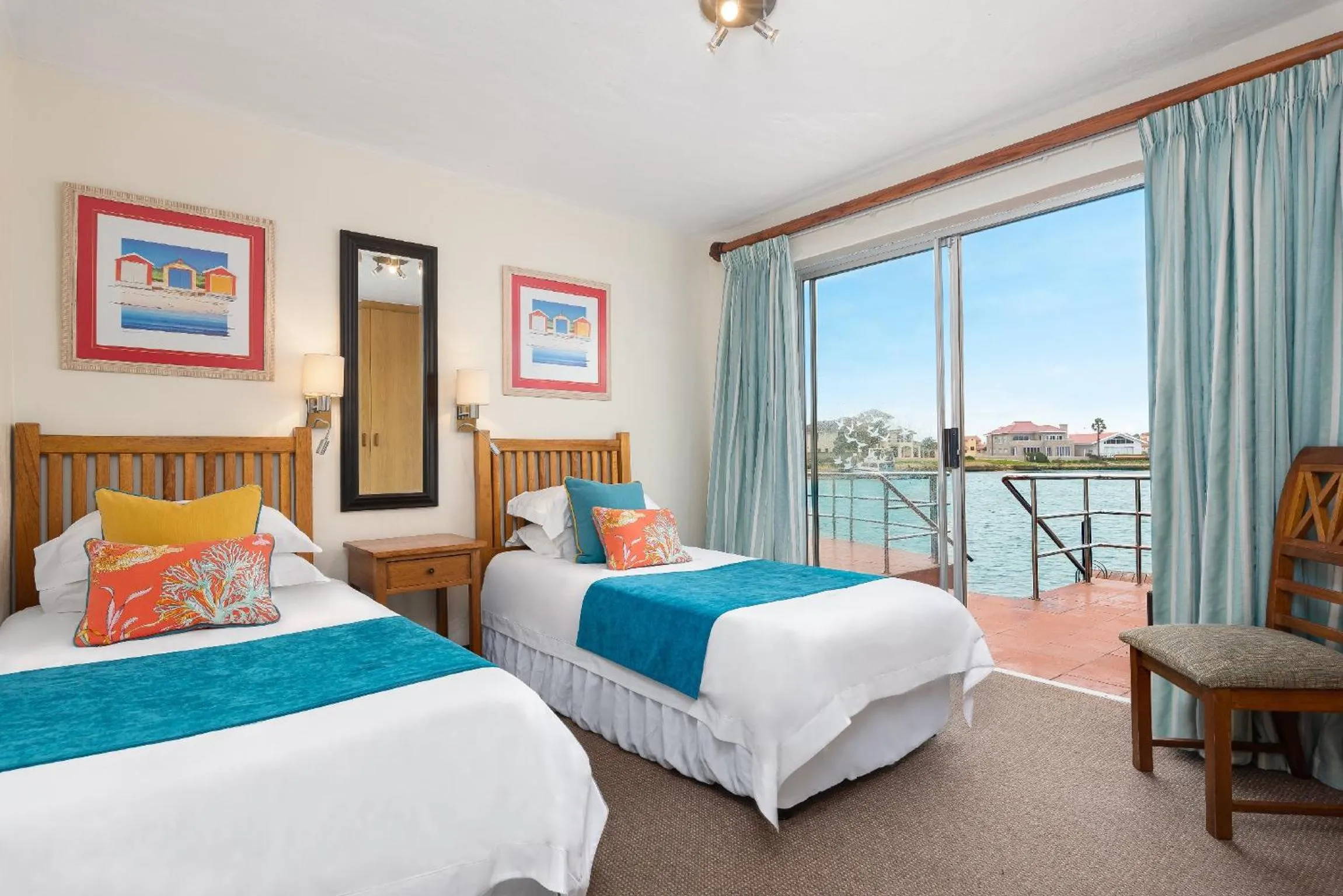 Photo of the whole room, Bed in First Group Port Owen Marina