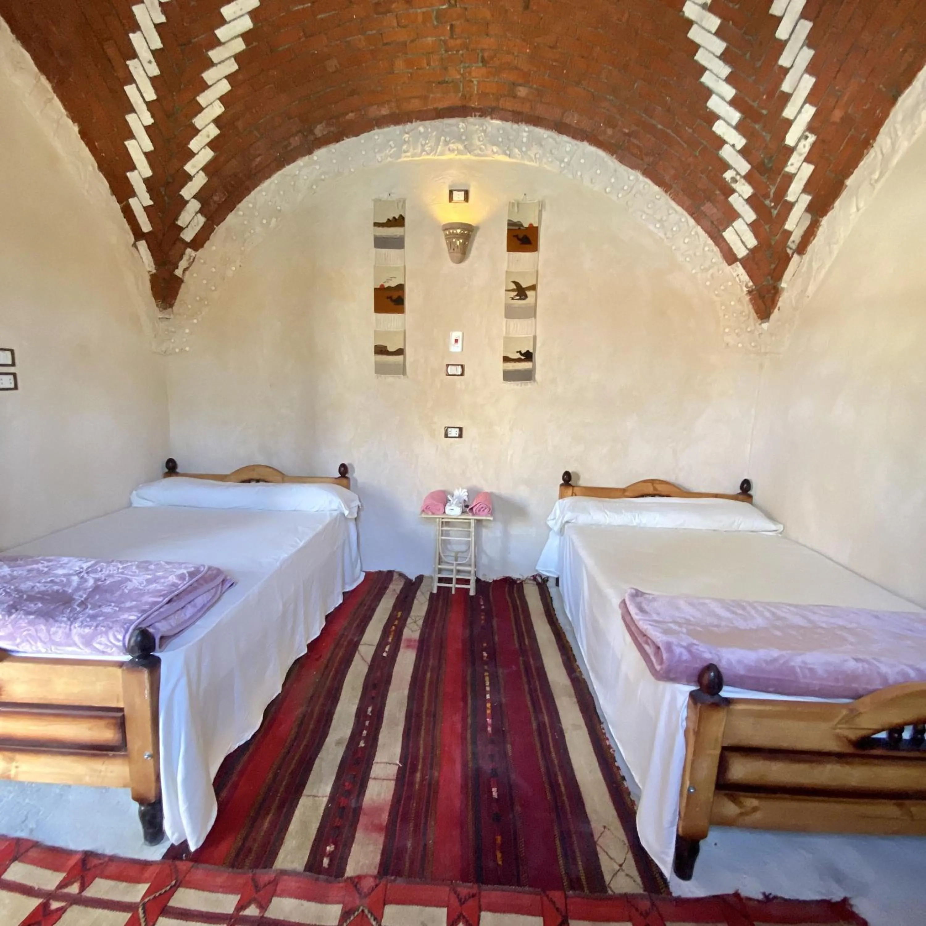 Bed in Siwa Palace Lodge