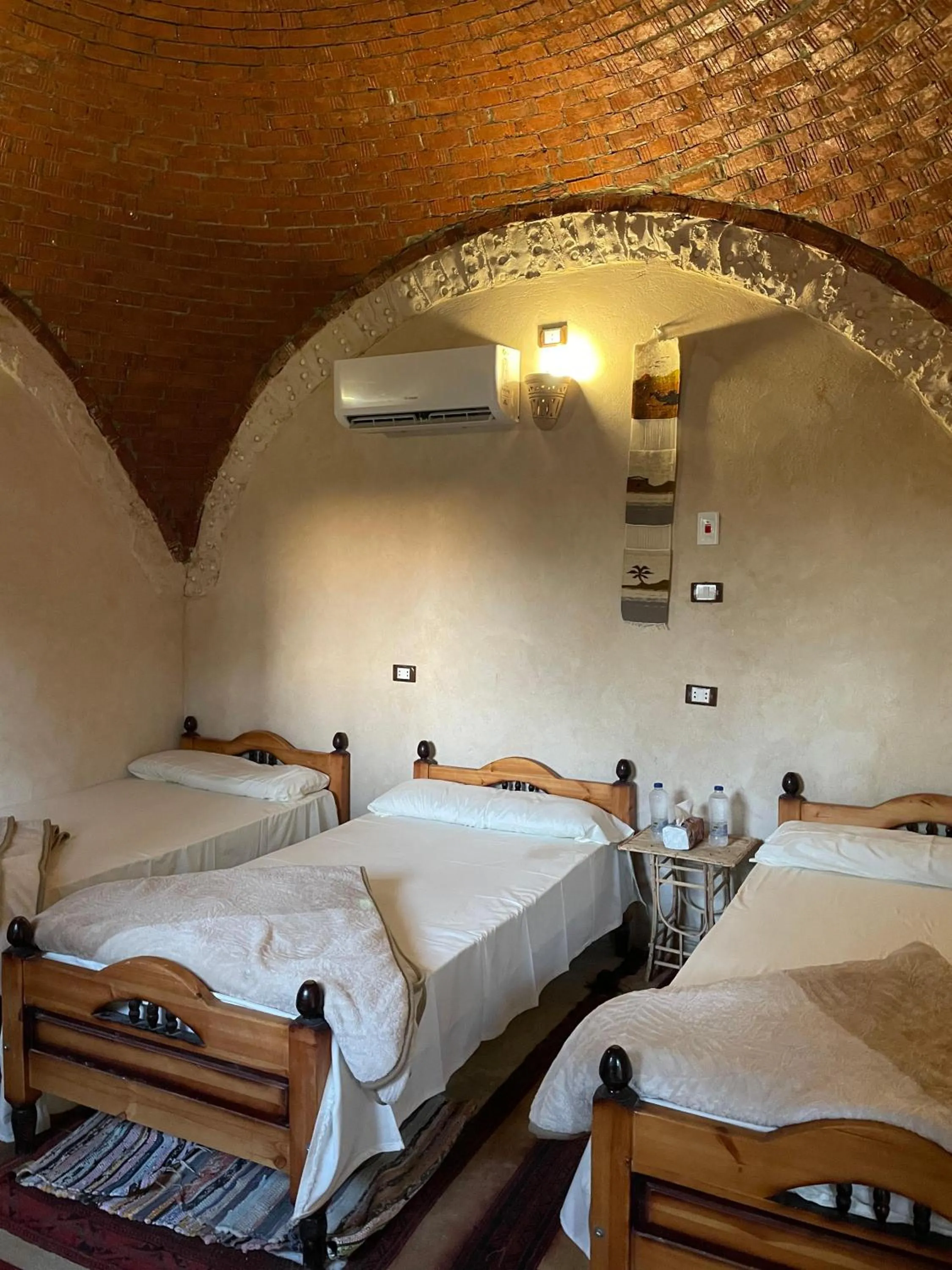 Bed in Siwa Palace Lodge