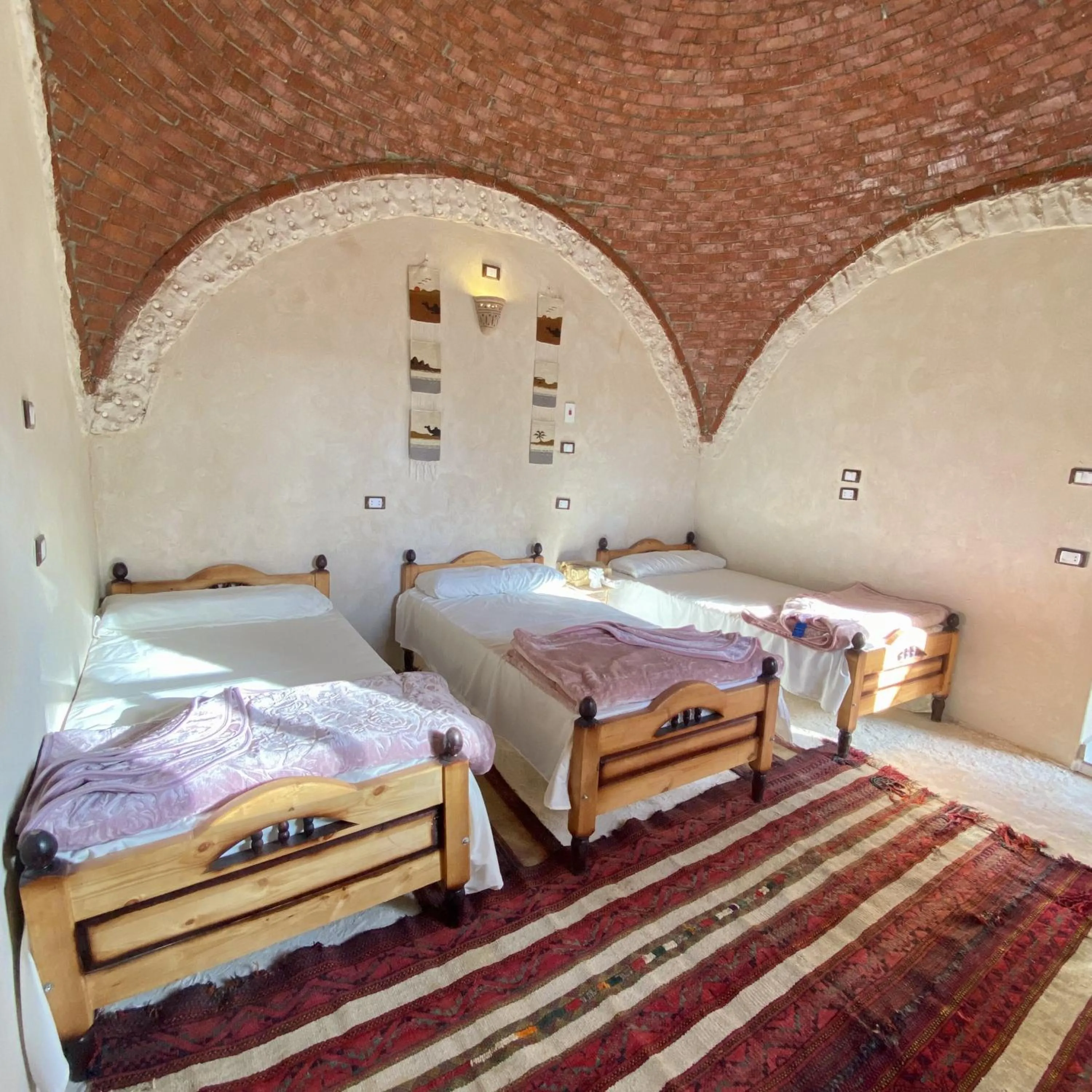 Bed in Siwa Palace Lodge