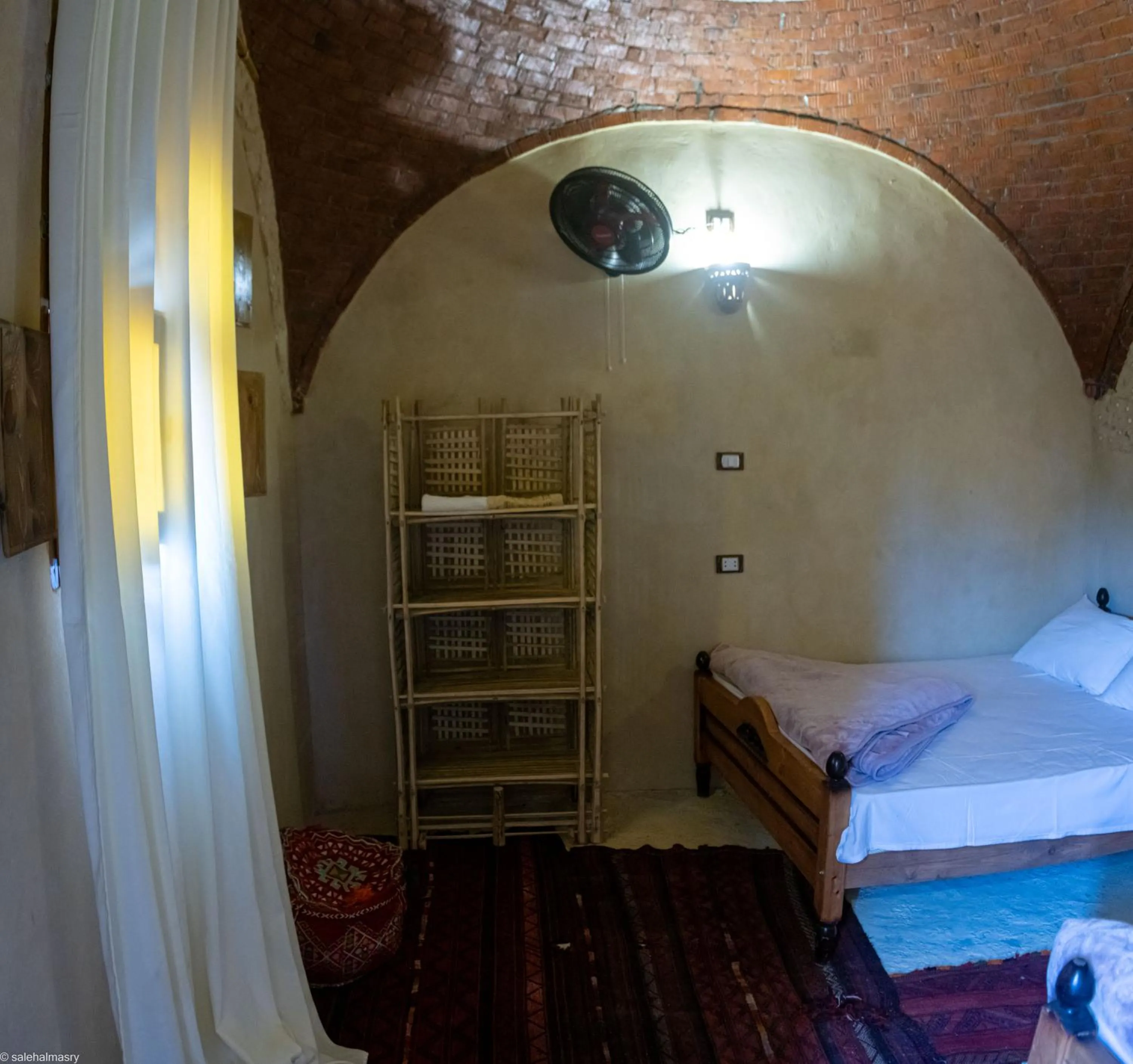 Bed in Siwa Palace Lodge
