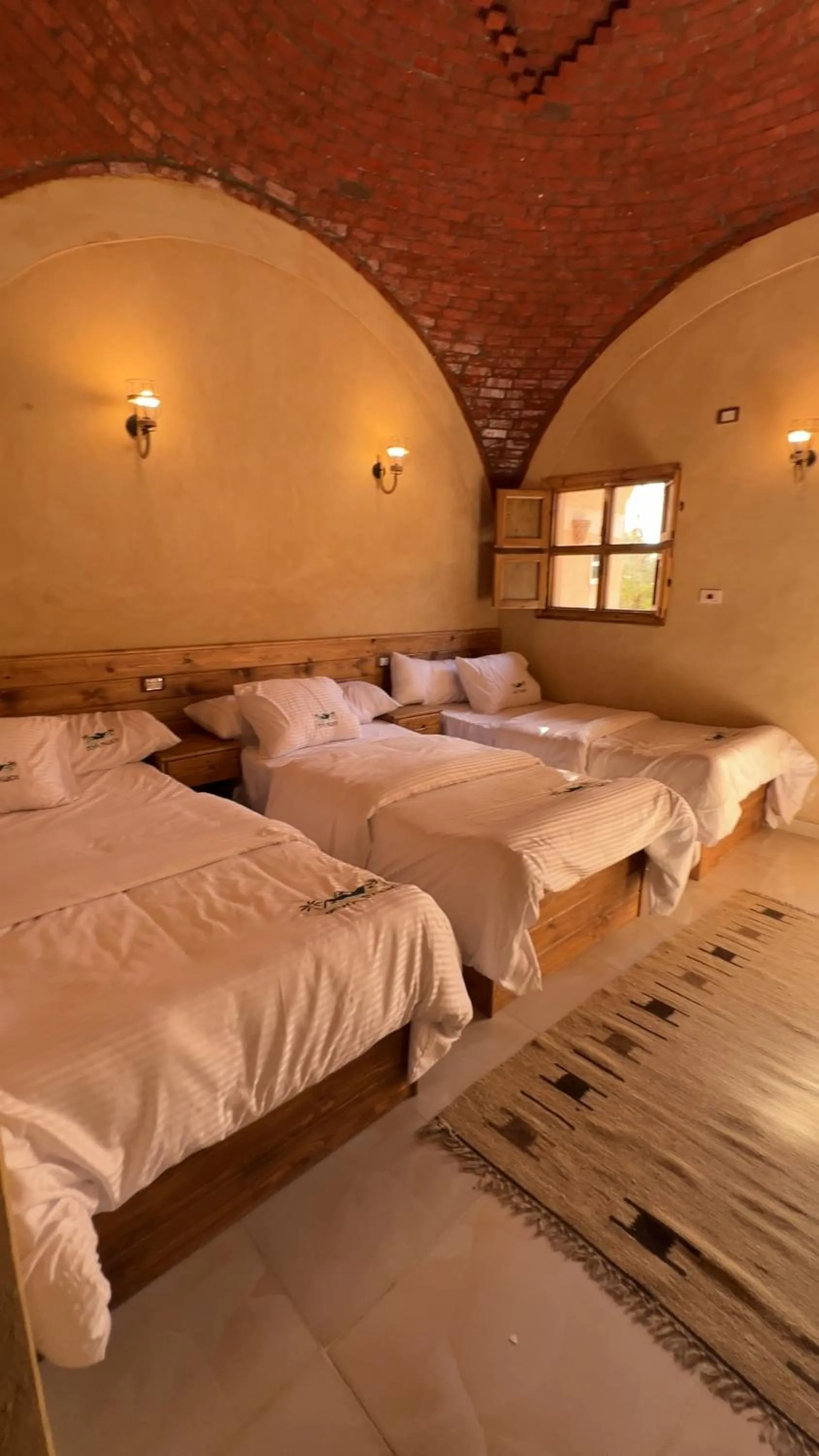 Bed in Siwa Palace Lodge