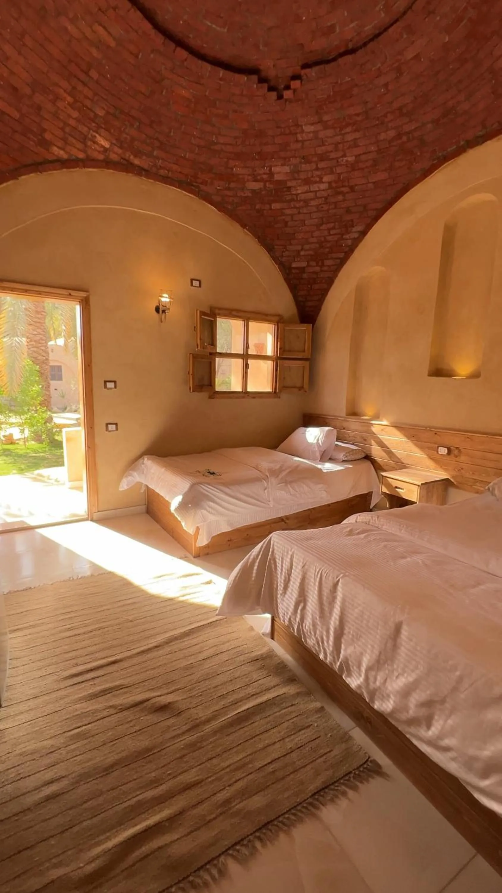 Bed in Siwa Palace Lodge
