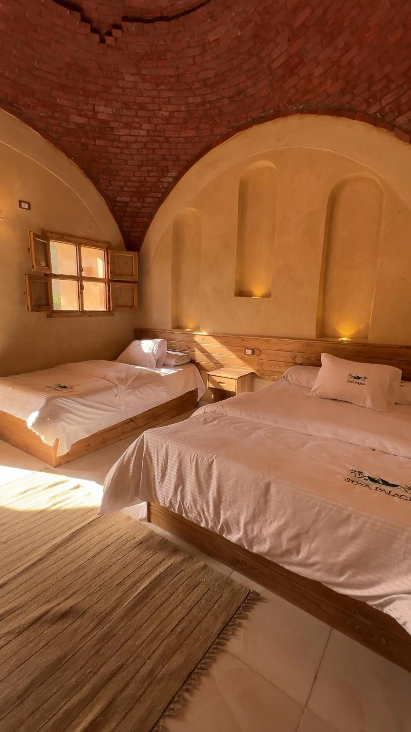 Bed in Siwa Palace Lodge