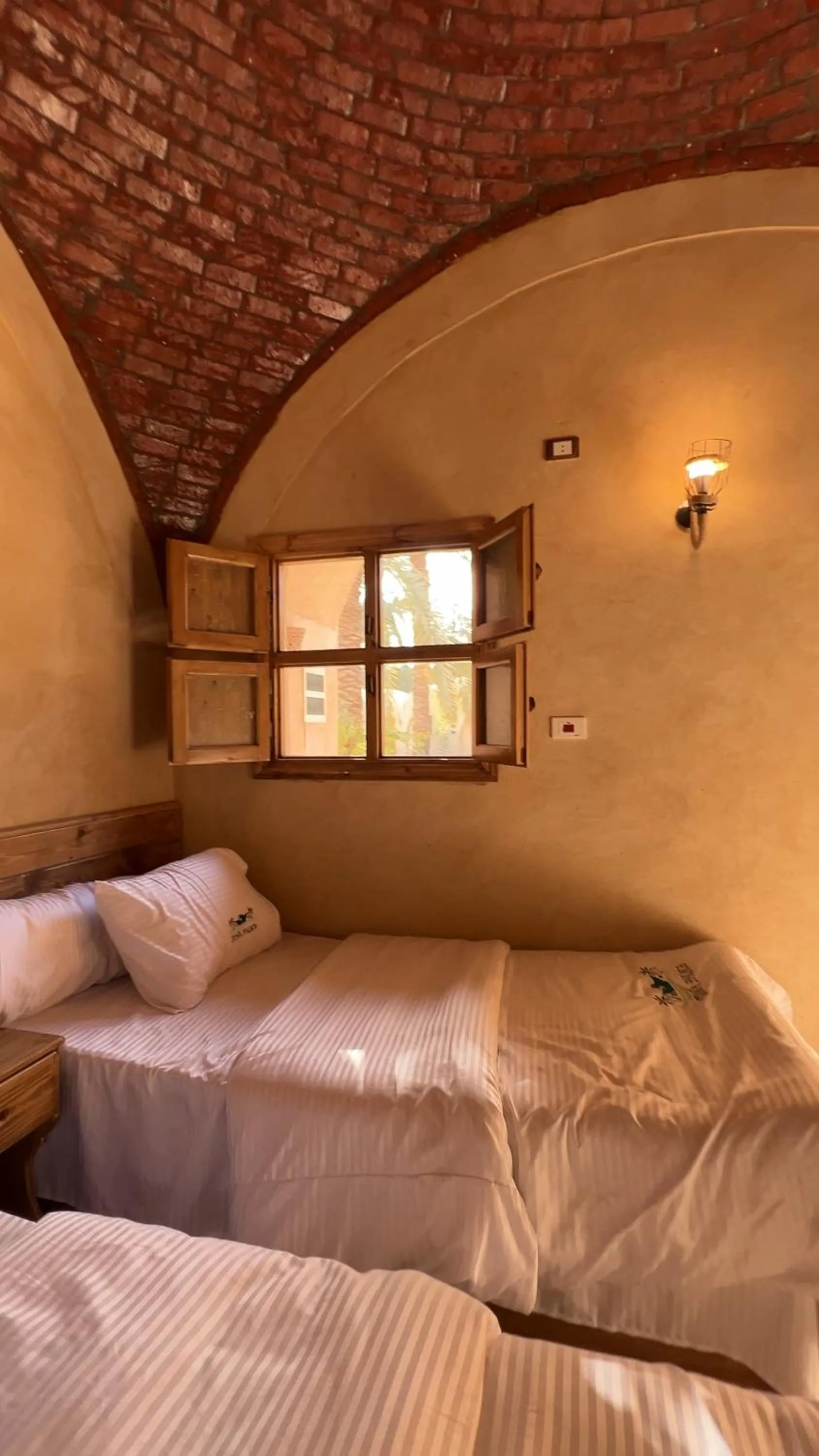 Bed in Siwa Palace Lodge