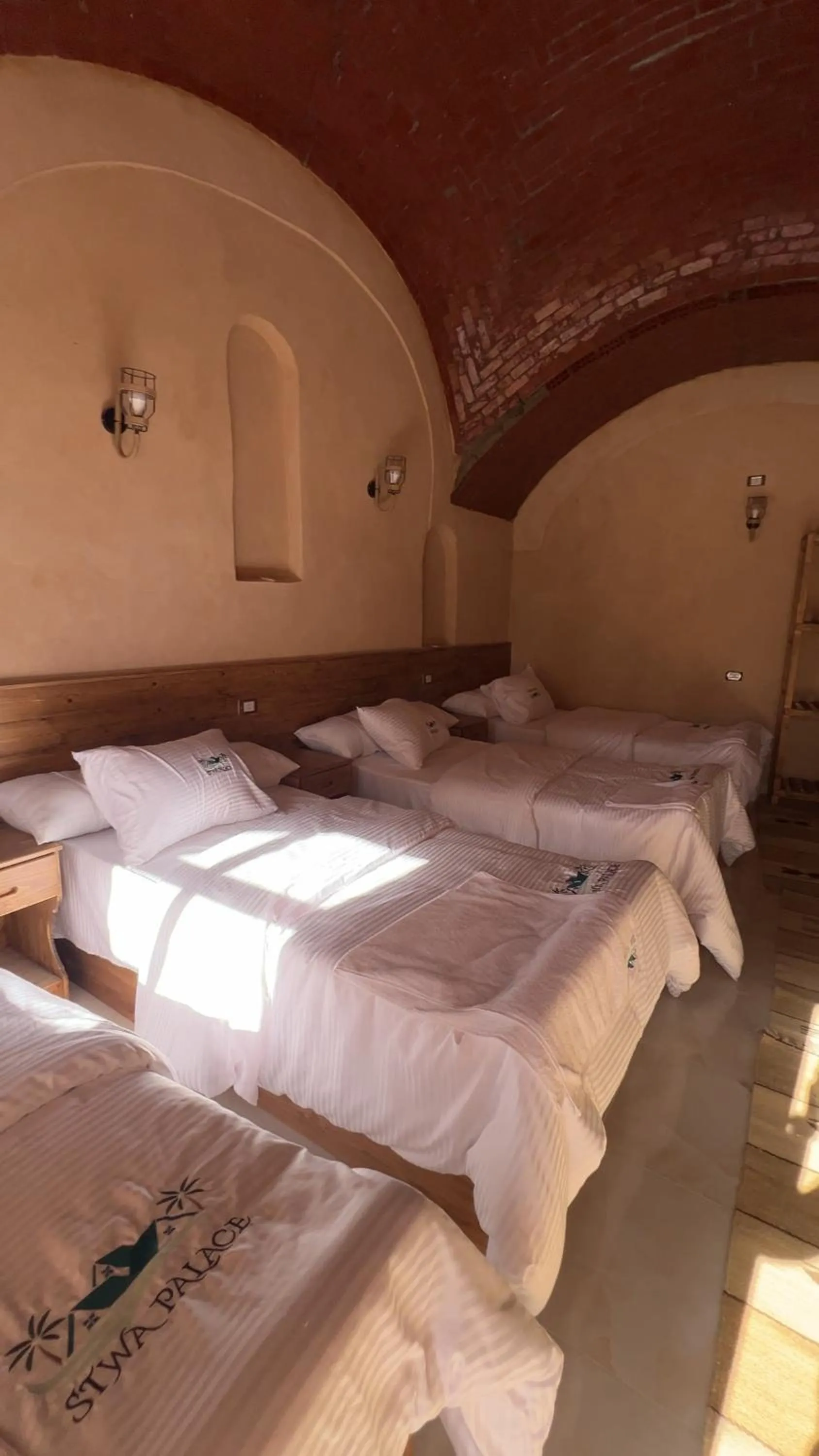 Bed in Siwa Palace Lodge