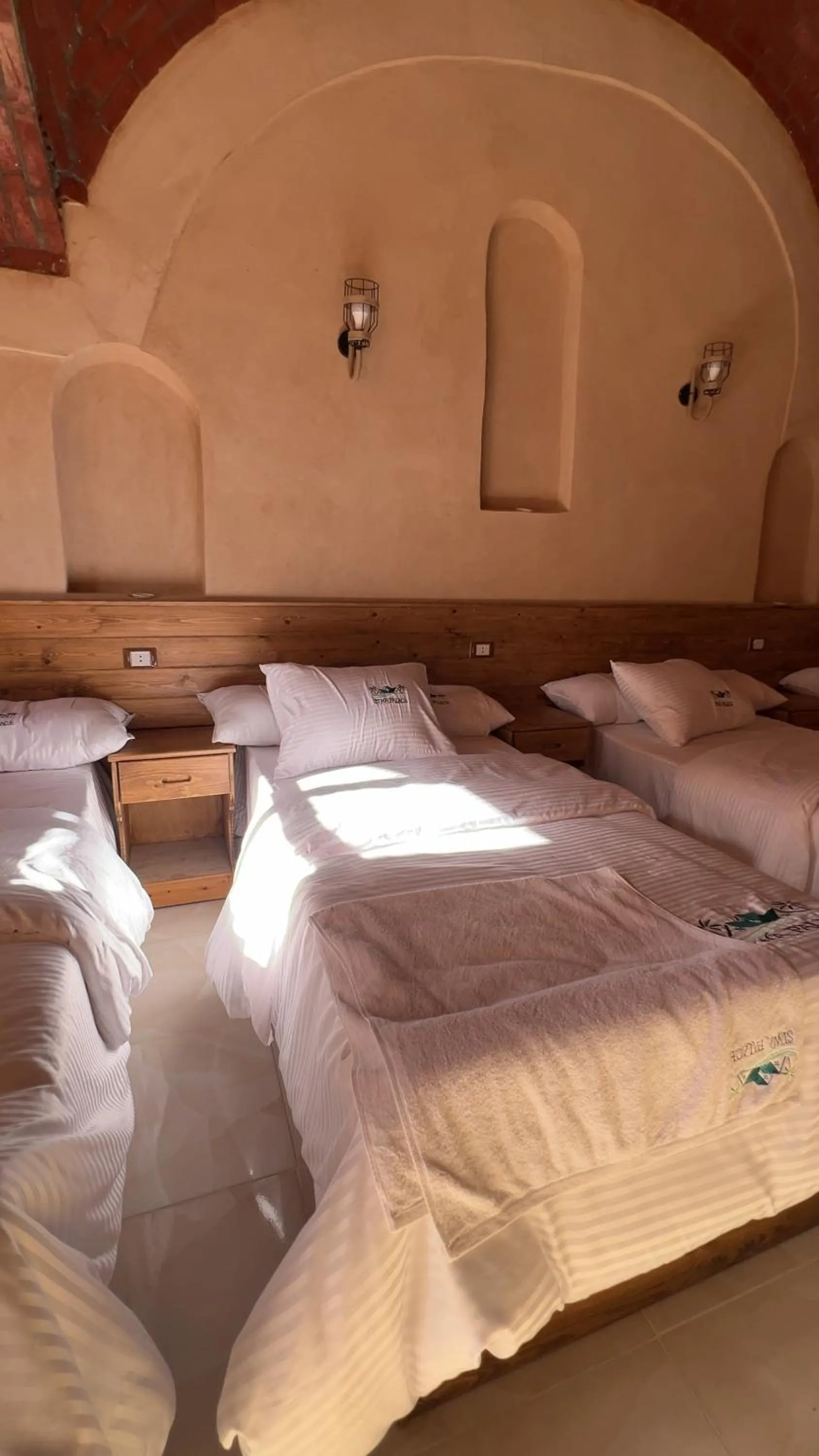 Bed in Siwa Palace Lodge