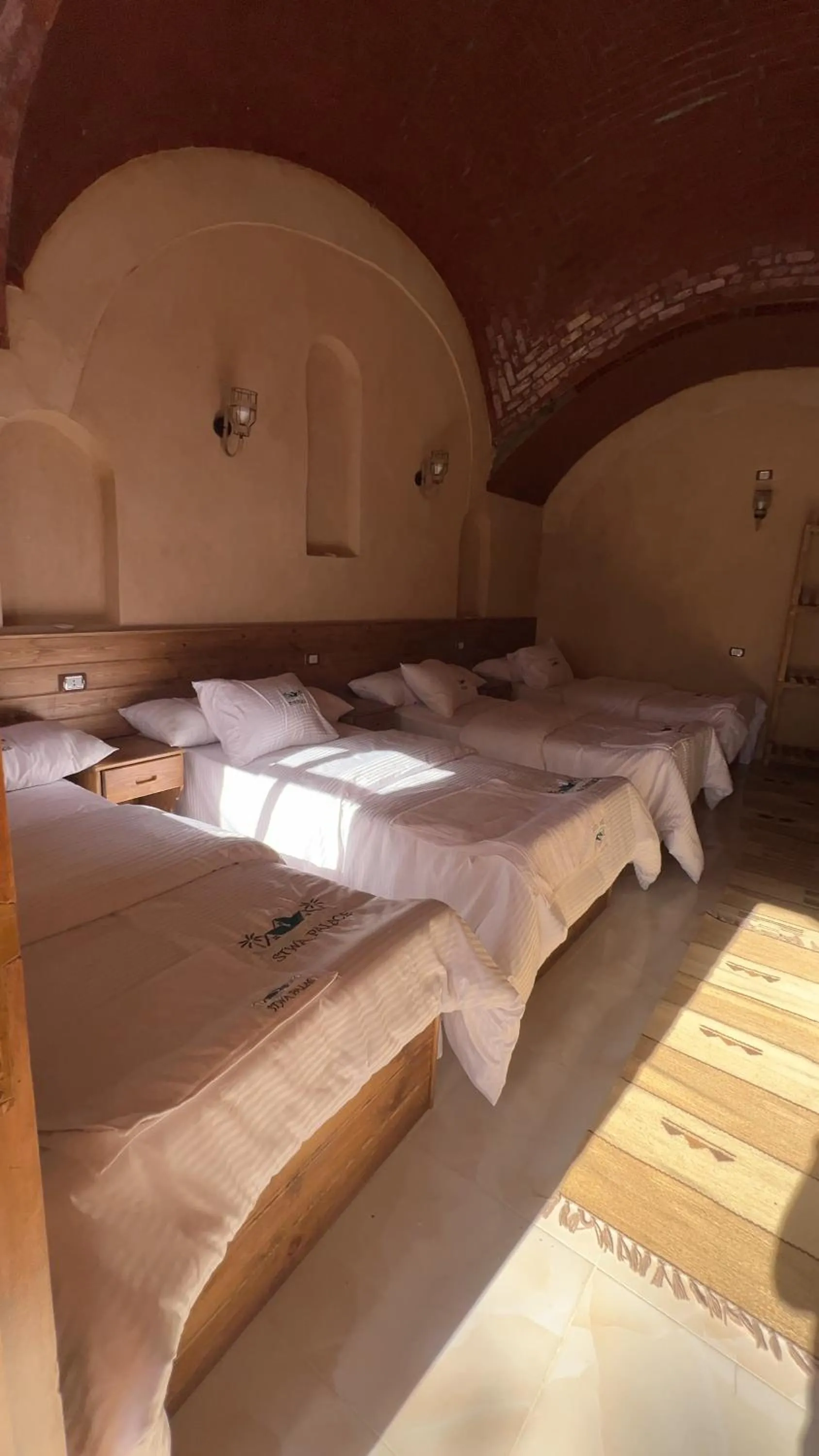 Bed in Siwa Palace Lodge