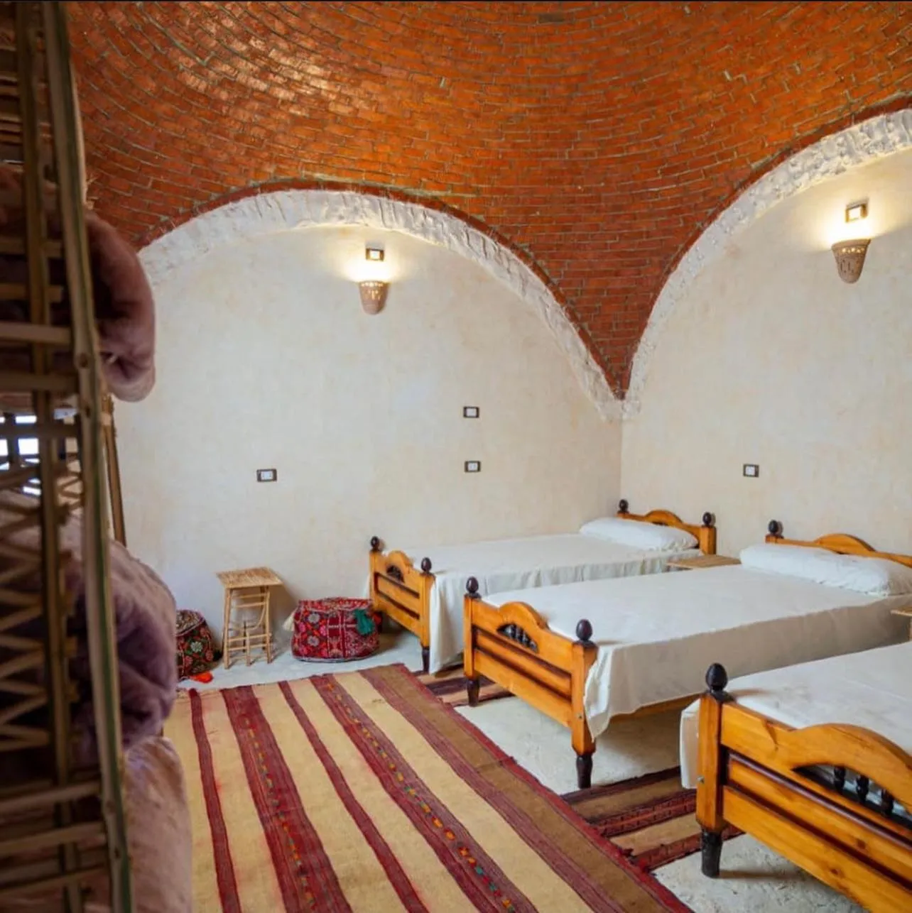 Bed in Siwa Palace Lodge