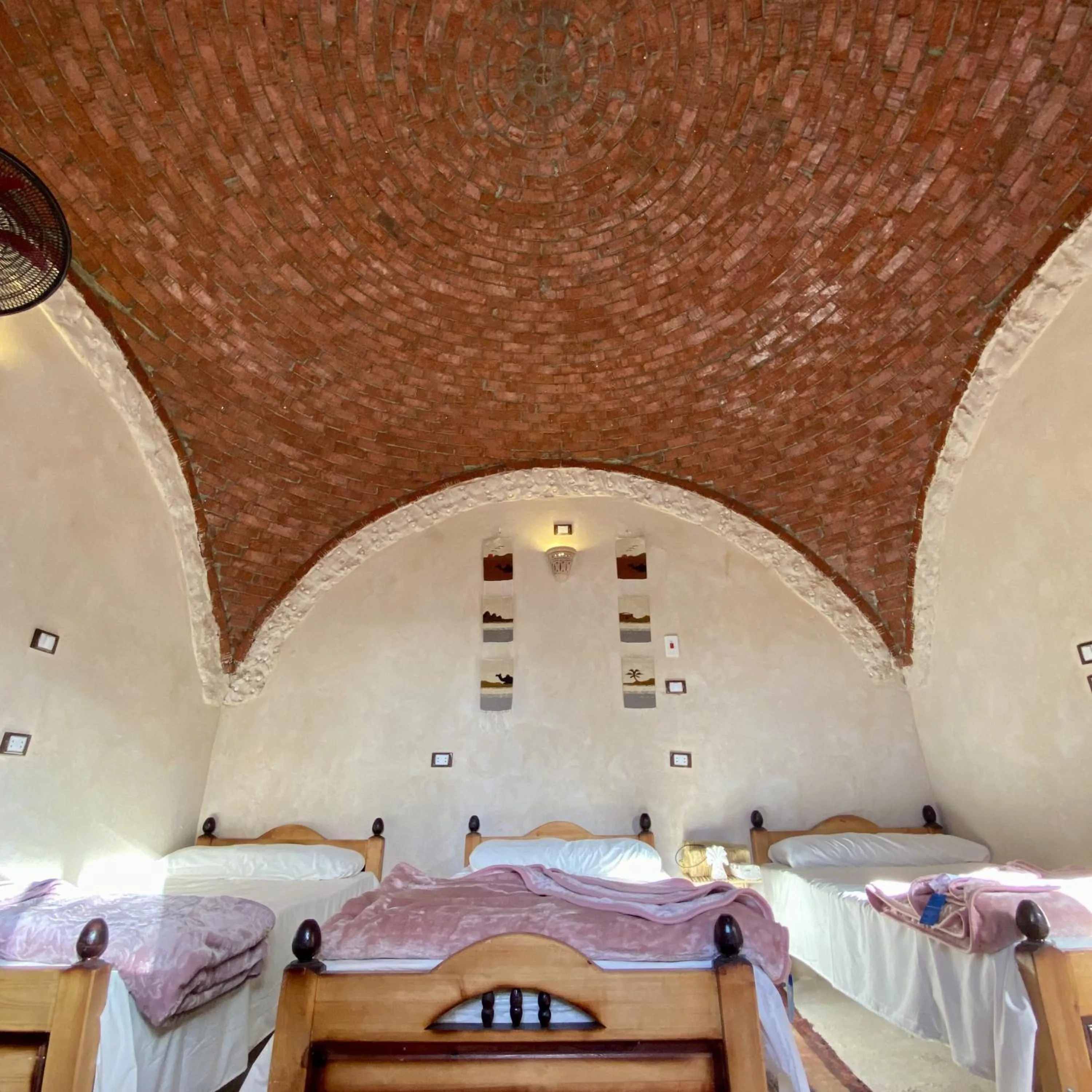 Bed in Siwa Palace Lodge
