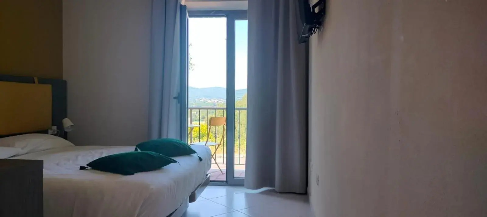 Bedroom, Bed in Tuscasì Aparthotel Bedroom, Bed in Tuscasì Aparthotel