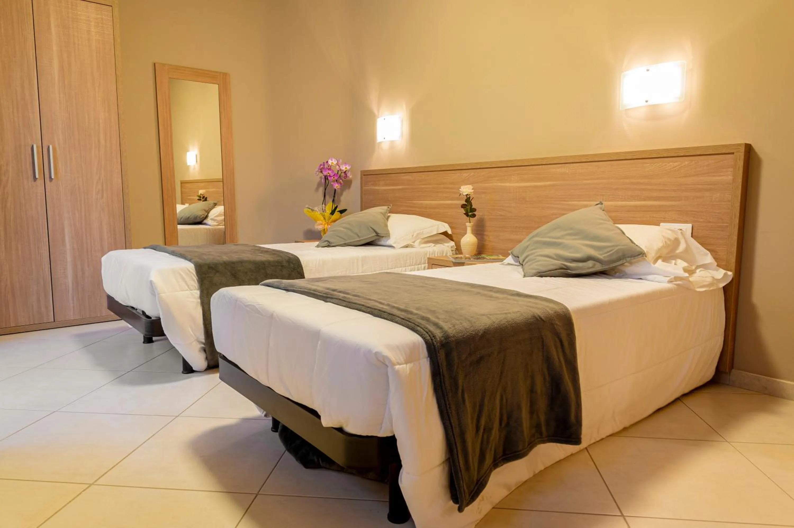 Bed in Tuscasì Aparthotel