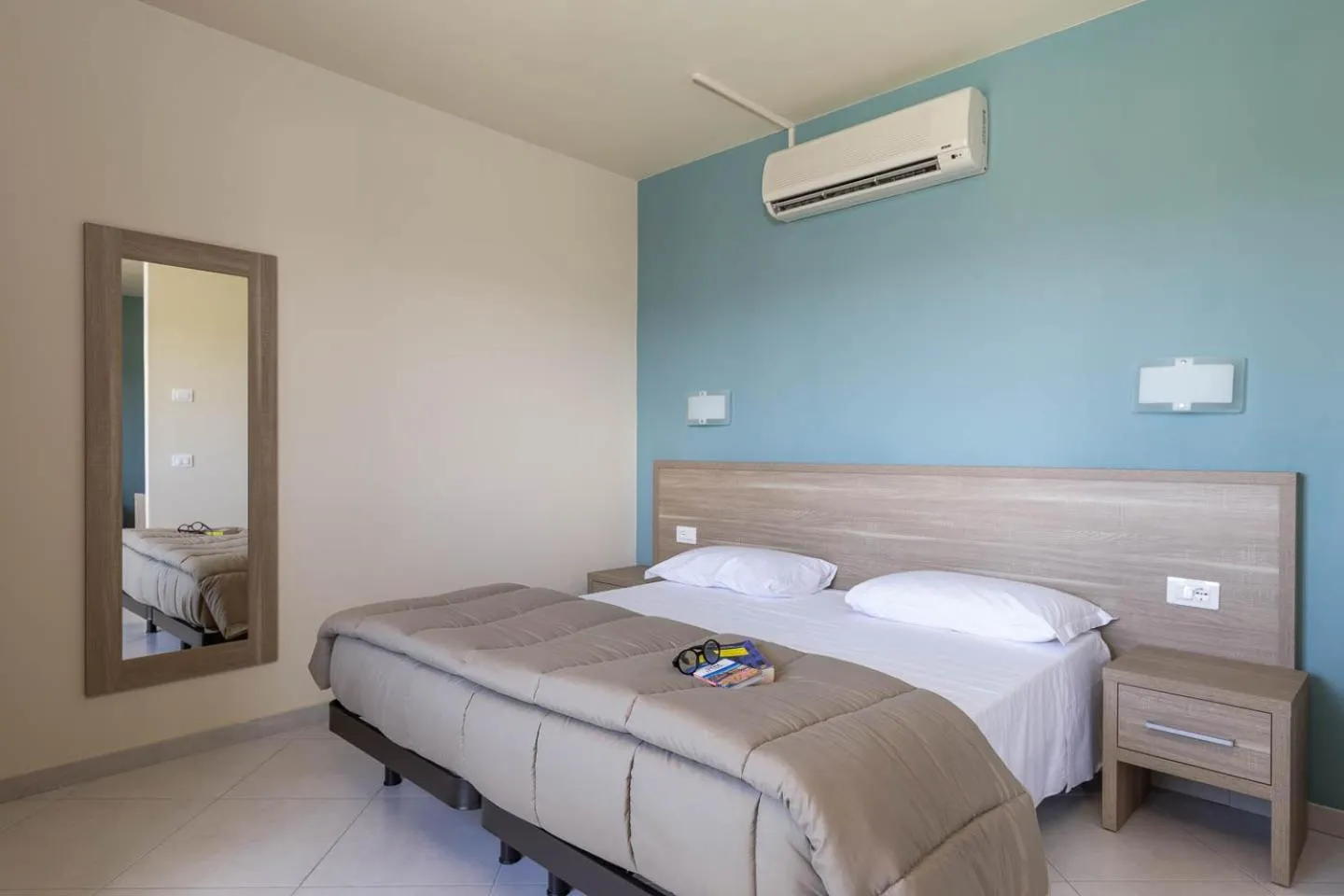 Bed in Tuscasì Aparthotel