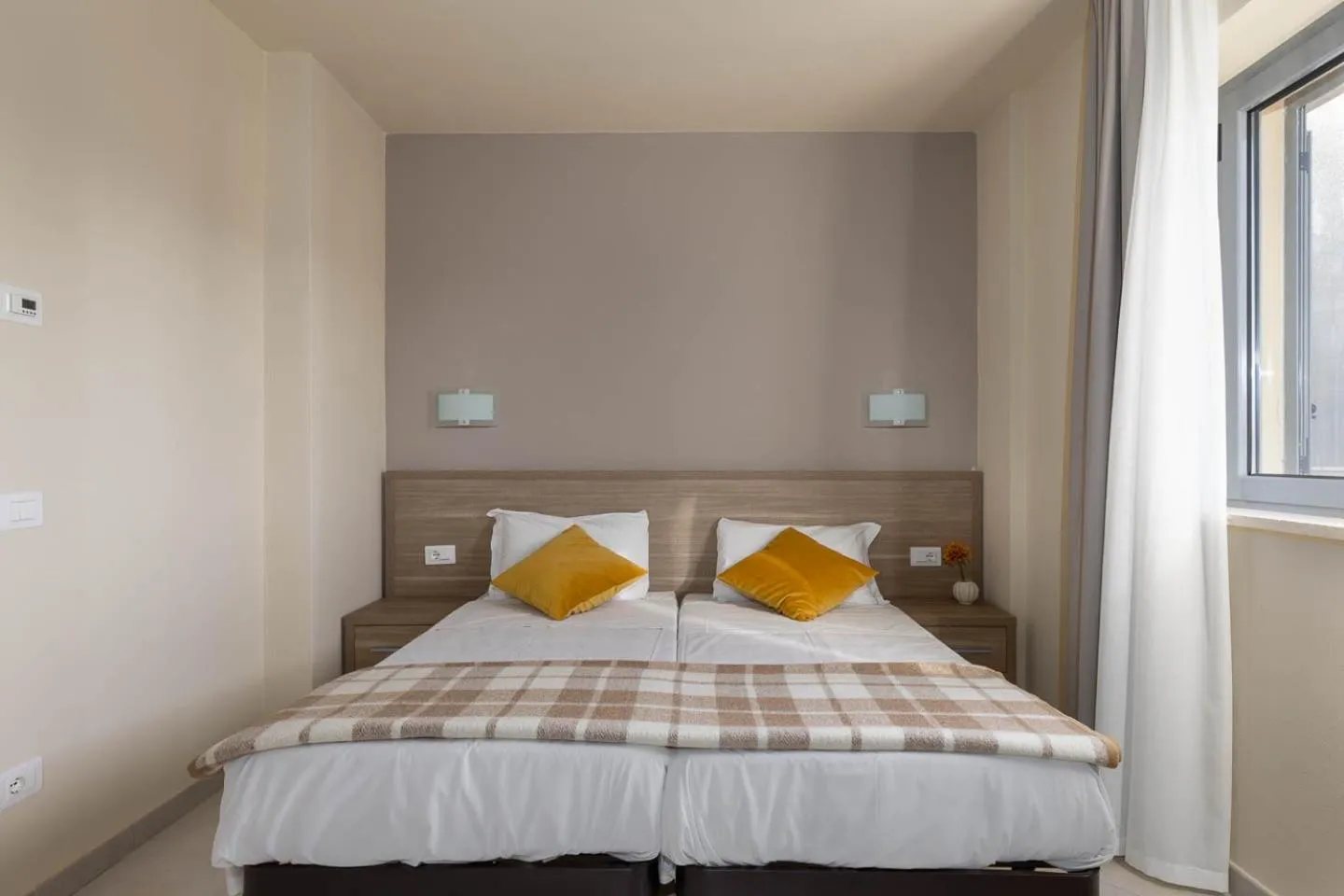 Bed in Tuscasì Aparthotel