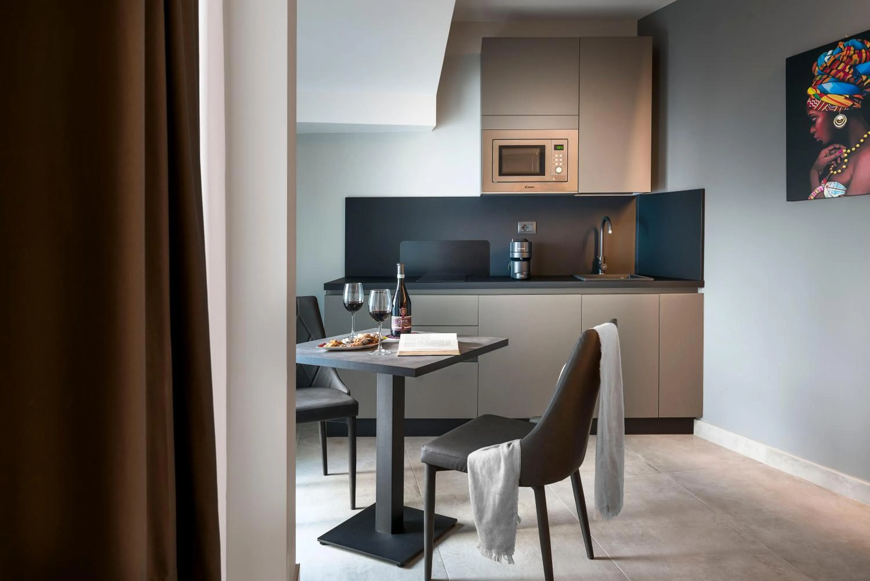 Kitchen or kitchenette in Emerald Hotel Residence Cefalù