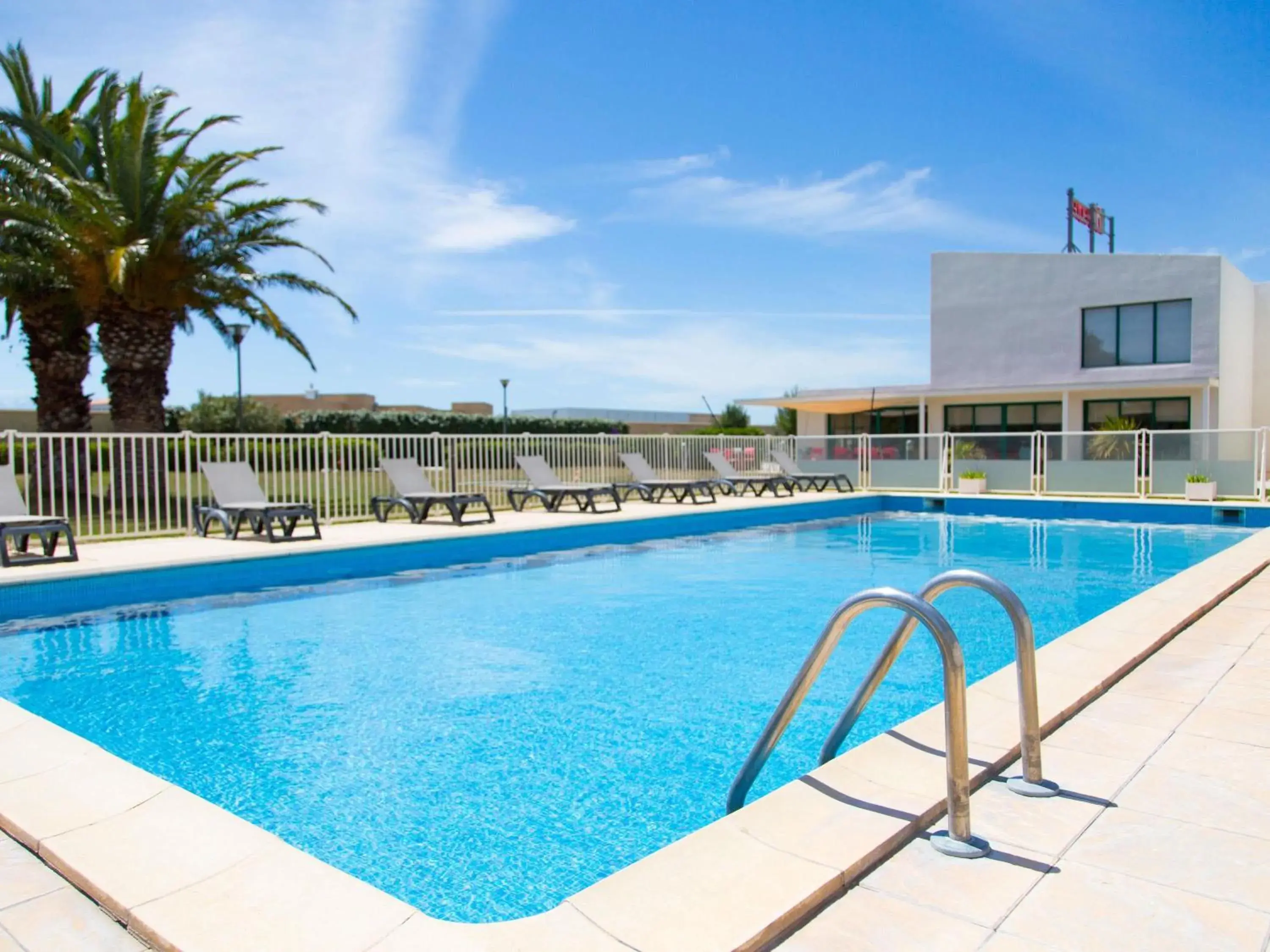 Pool view in ibis Perpignan Nord Rivesaltes Pool view in ibis Perpignan Nord Rivesaltes