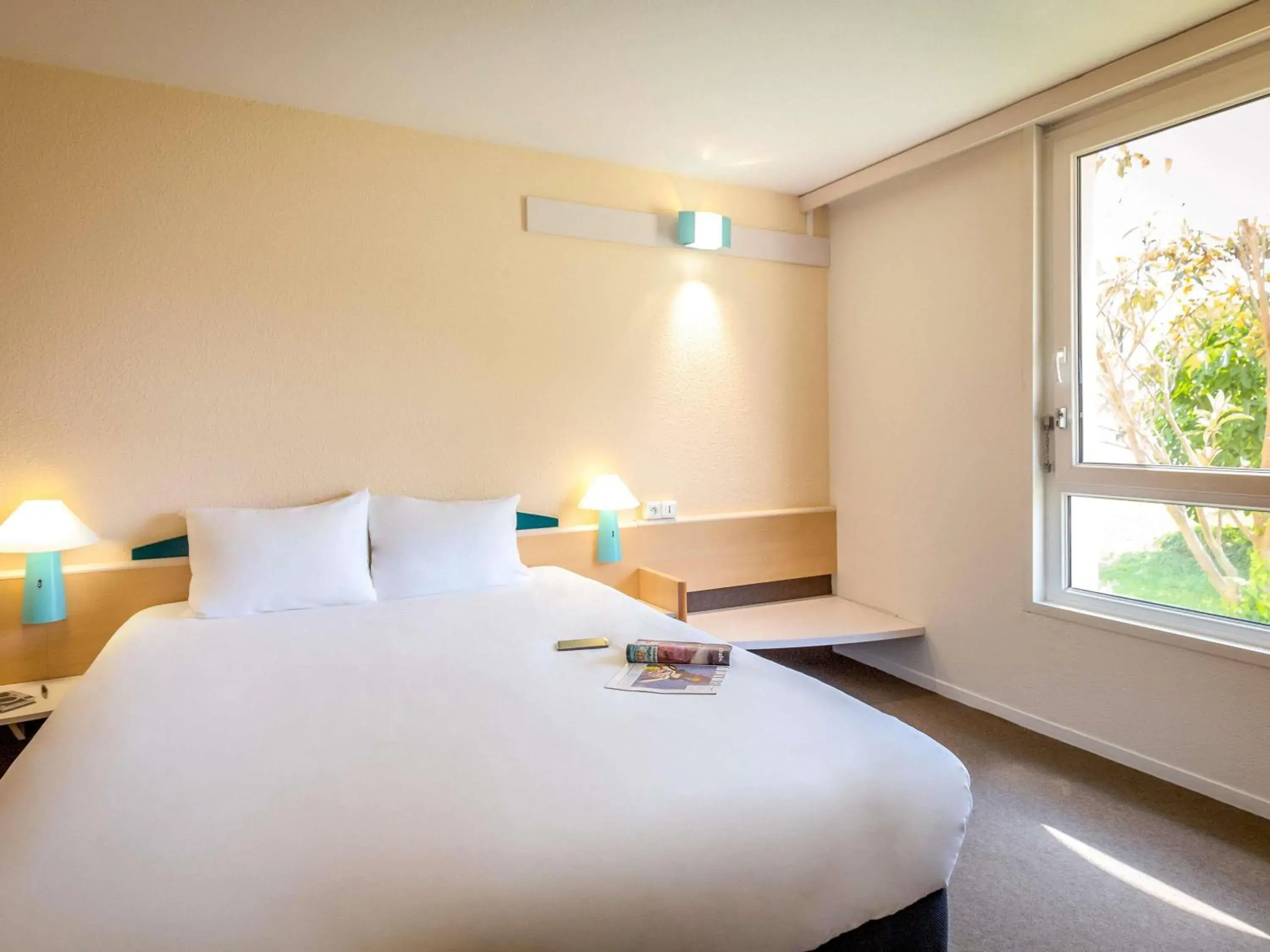 Property building, Bed in ibis Perpignan Nord Rivesaltes Property building, Bed in ibis Perpignan Nord Rivesaltes