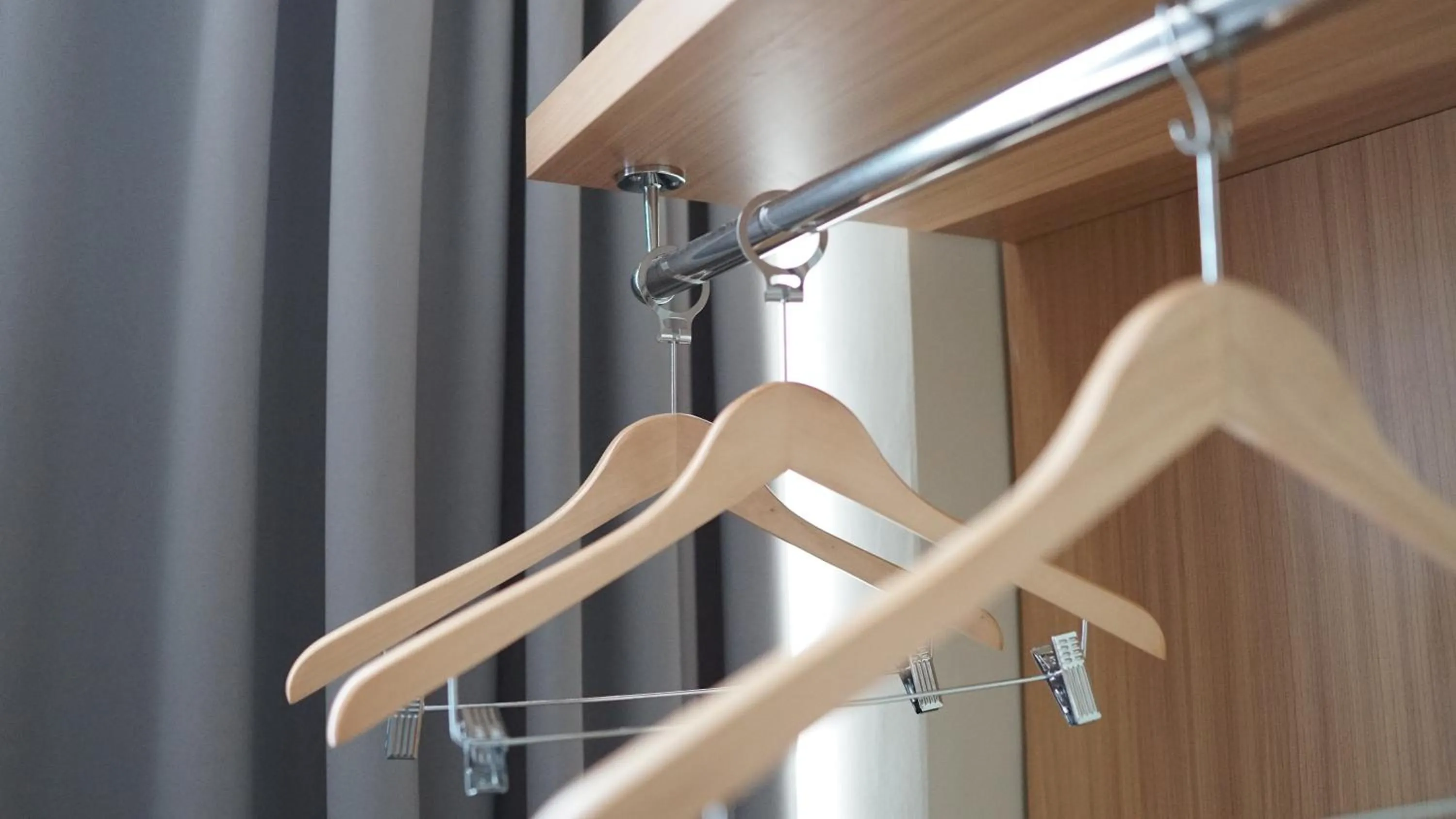 wardrobe in Hotel Laksana Solo Managed By Dafam