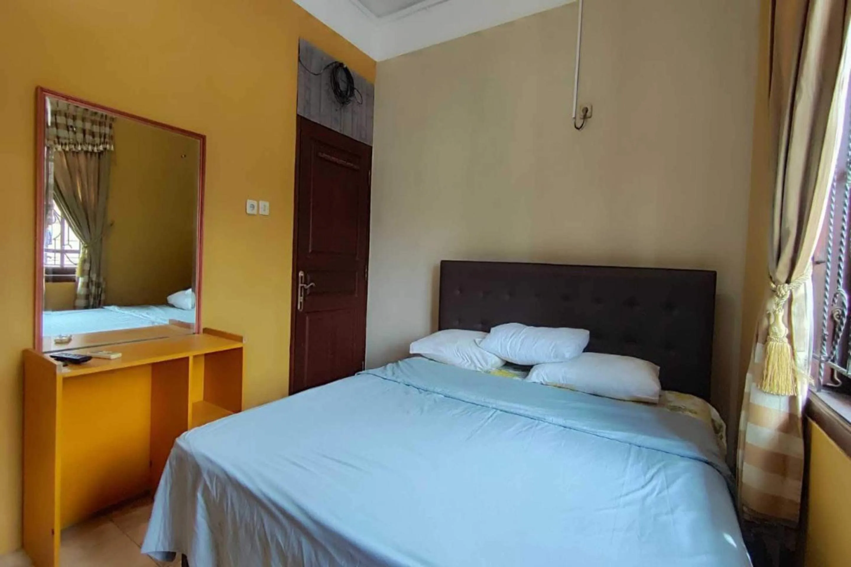 Economy Double Room in Hotel O Griya Pius Syariah Malioboro