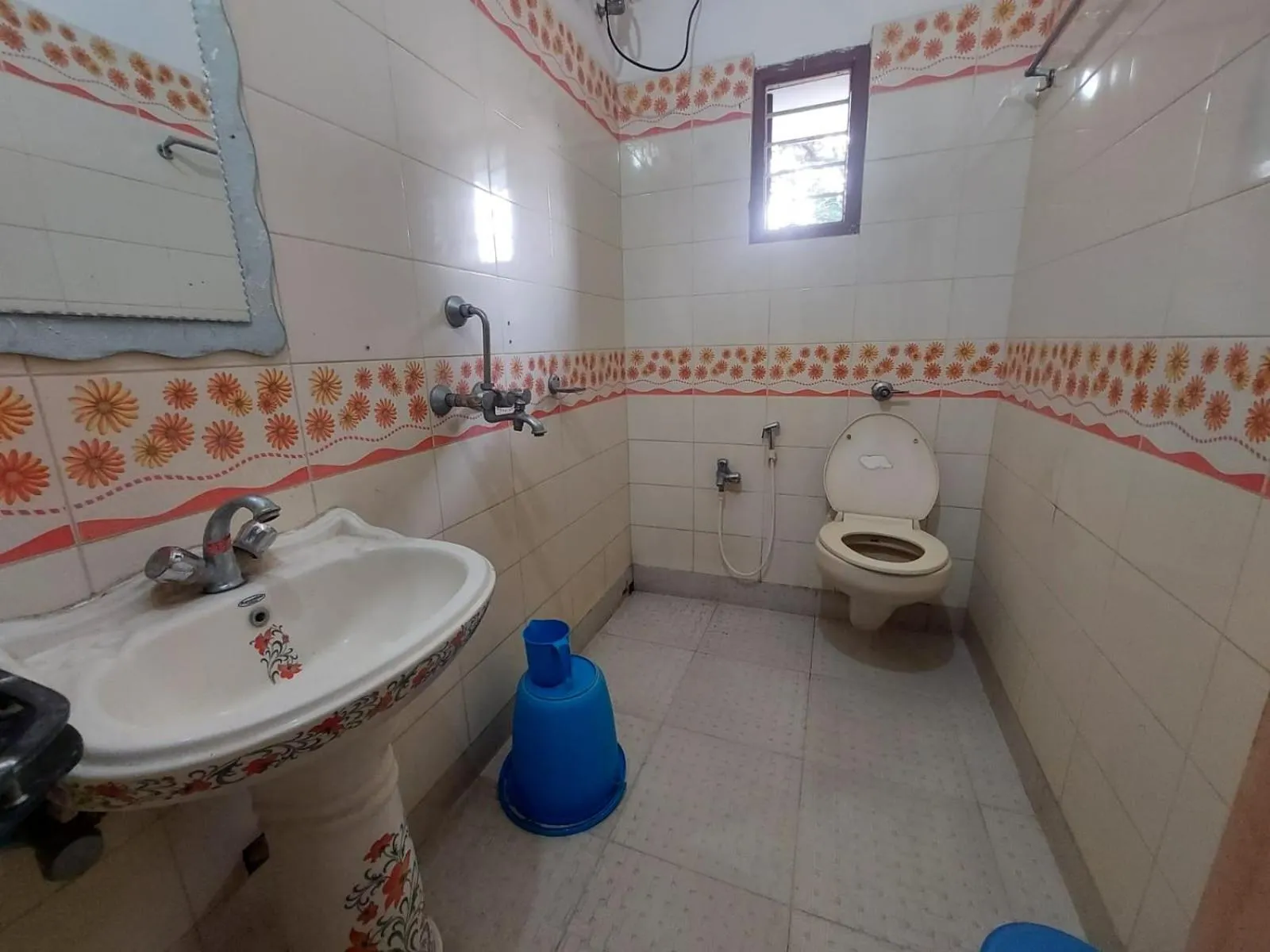 Bathroom in Rajlaxmi Resort - Pure Veg