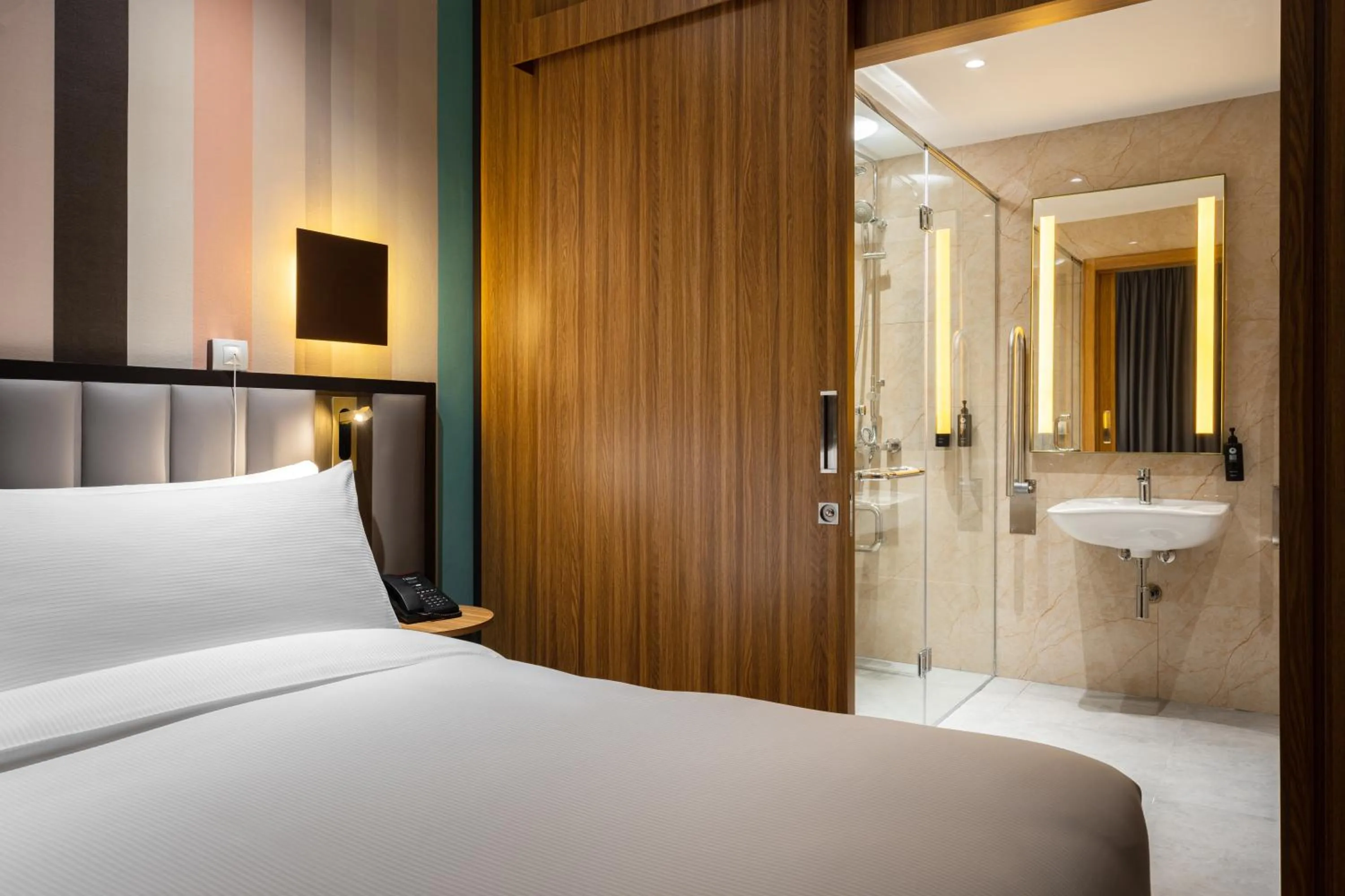 Bathroom, Bed in Ramada Encore by Wyndham Tashkent