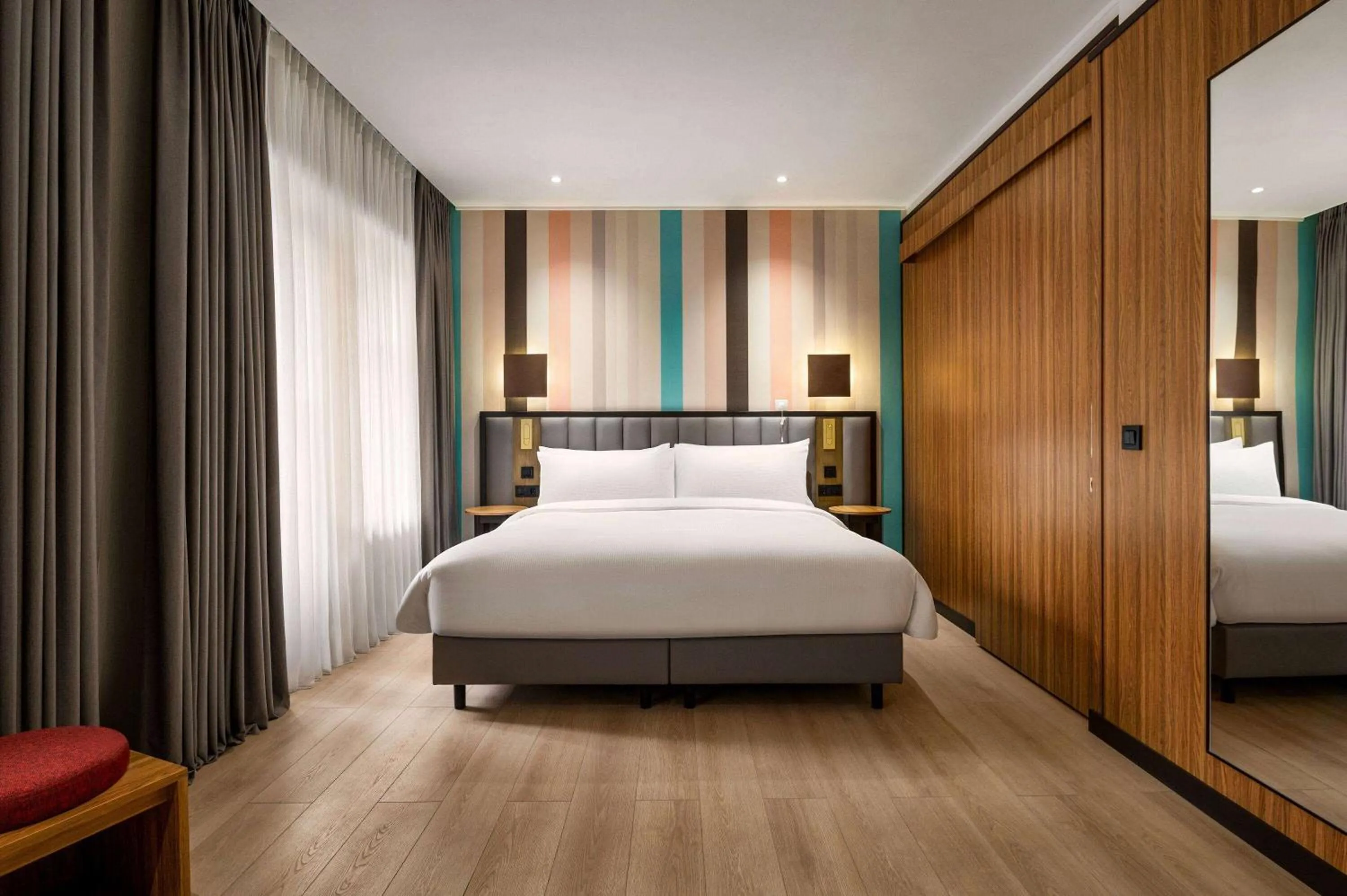 Photo of the whole room, Bed in Ramada Encore by Wyndham Tashkent