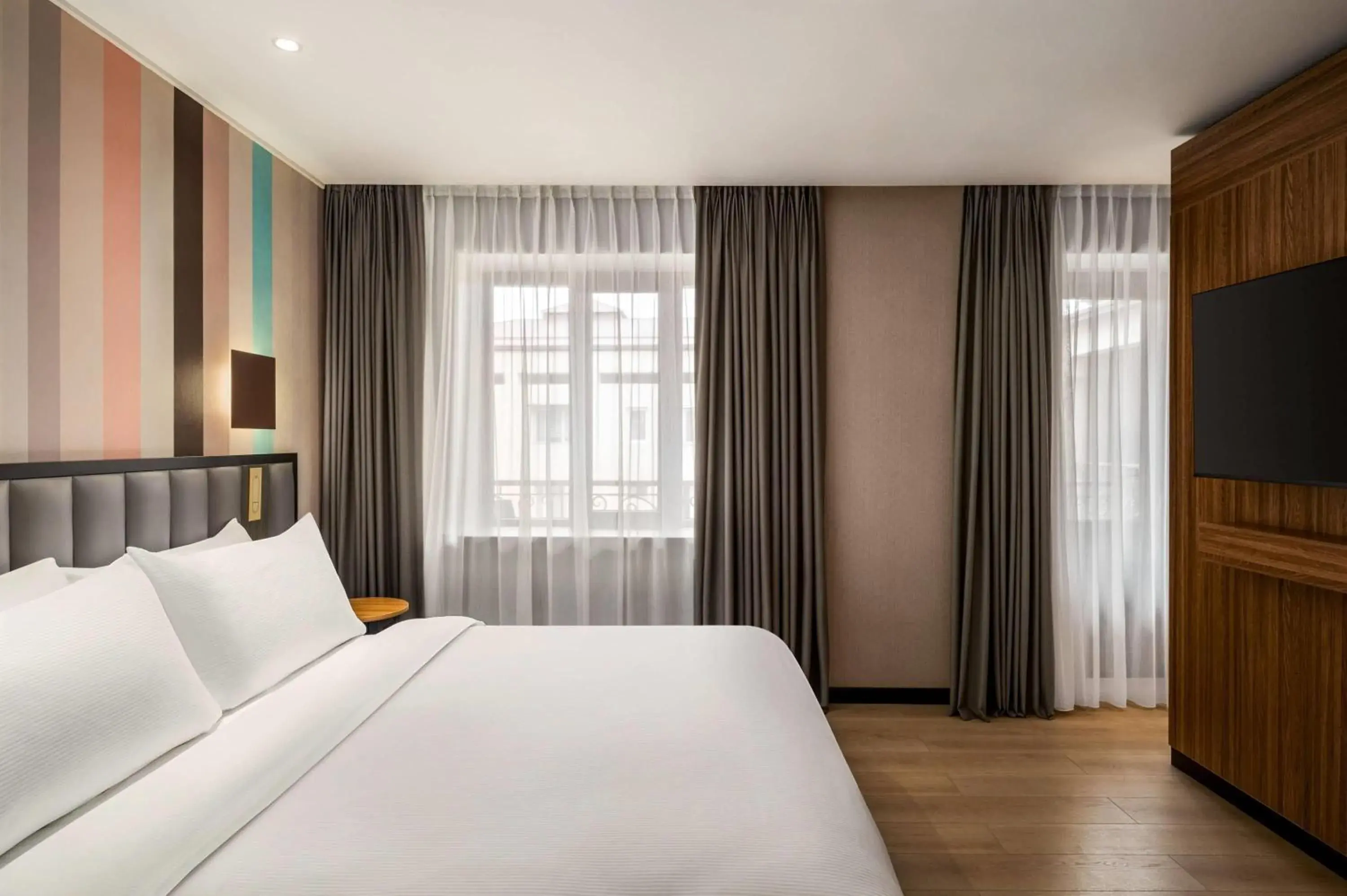 Photo of the whole room, Bed in Ramada Encore by Wyndham Tashkent Photo of the whole room, Bed in Ramada Encore by Wyndham Tashkent