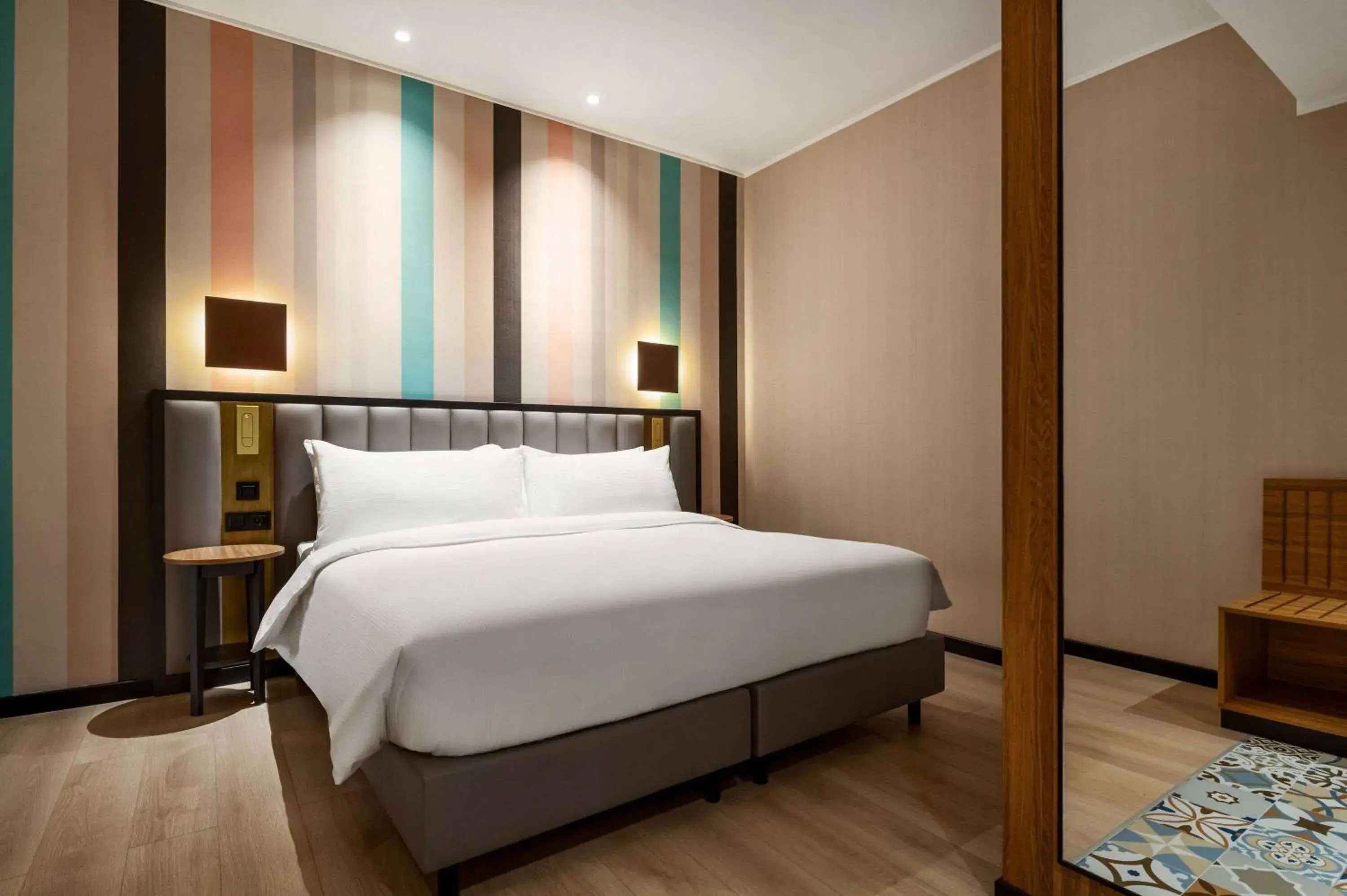 Bed in Ramada Encore by Wyndham Tashkent Bed in Ramada Encore by Wyndham Tashkent