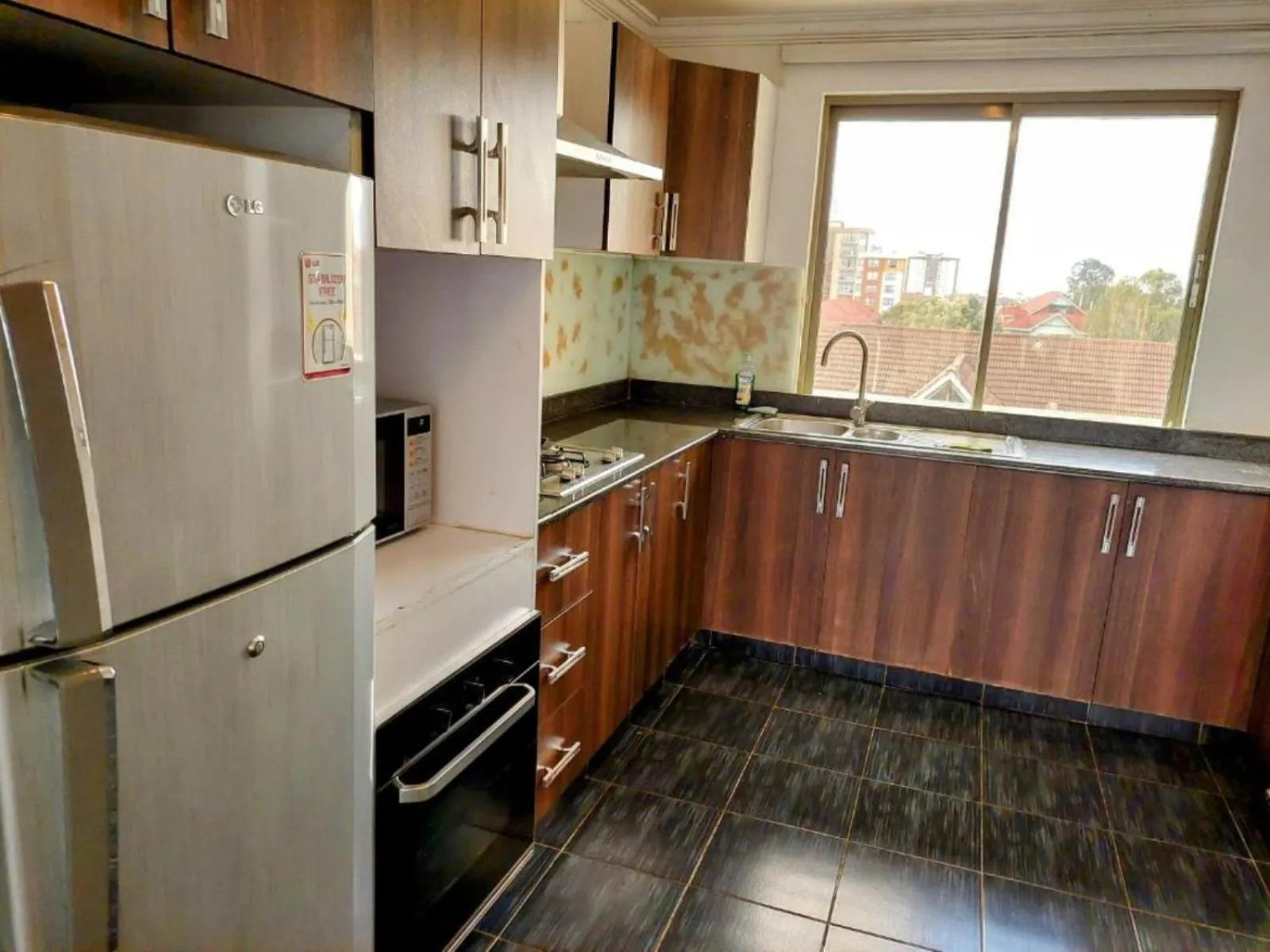 Kitchen or kitchenette in Eldon Apartments & Suites