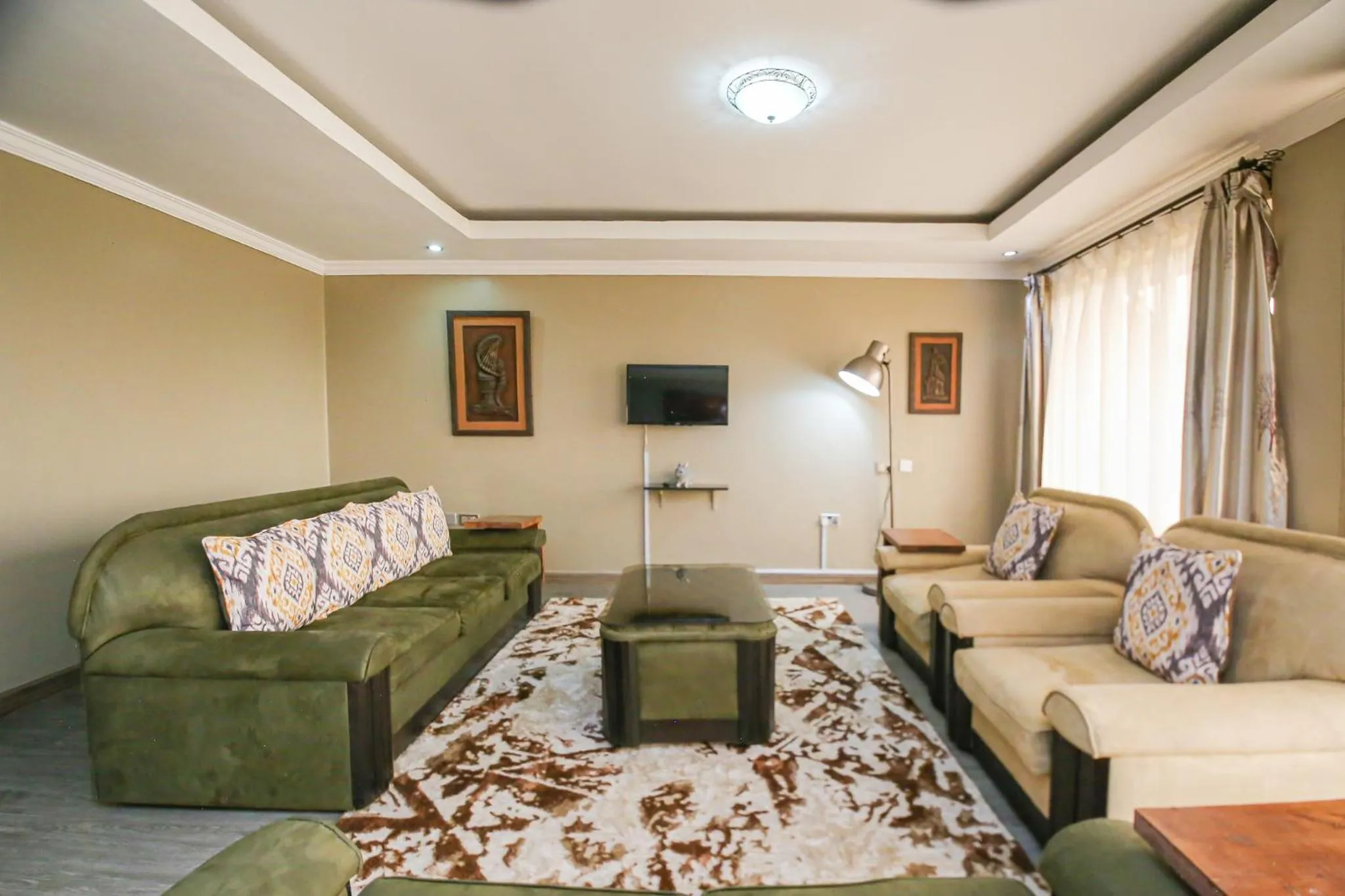 Living room in Eldon Apartments & Suites