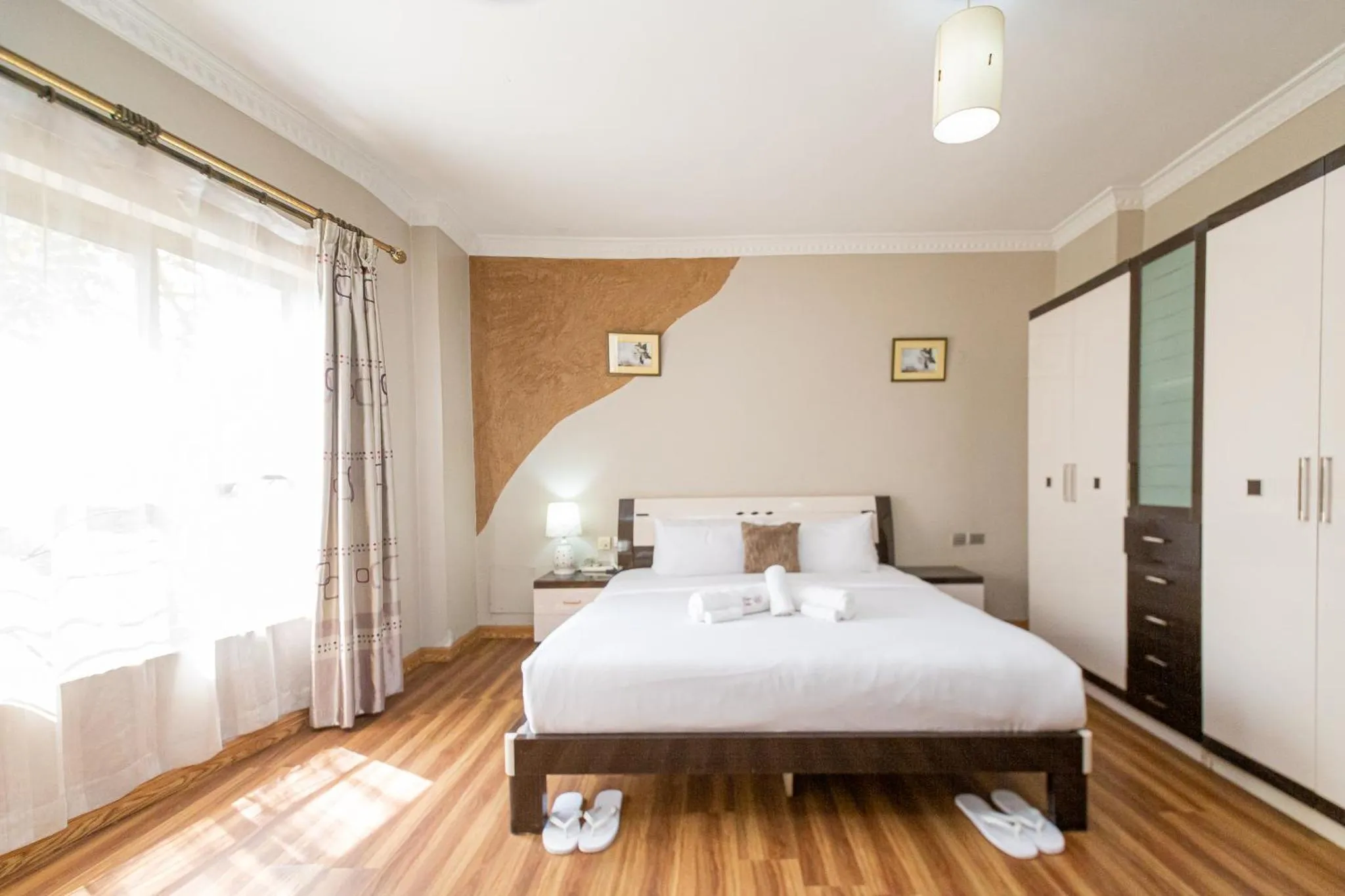 Bed in Eldon Apartments & Suites