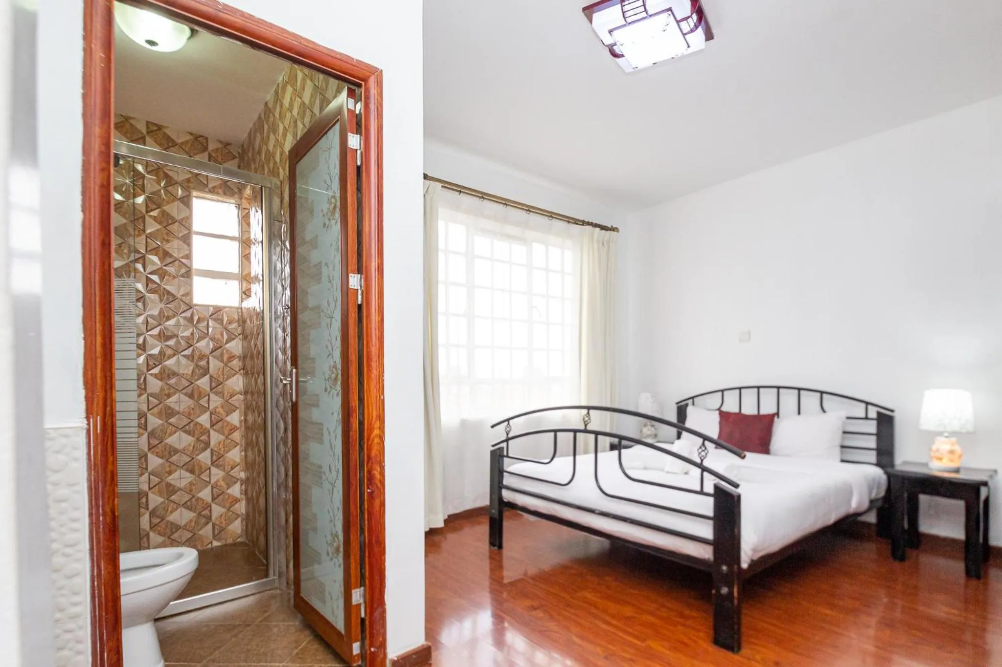 Bed in Eldon Apartments & Suites