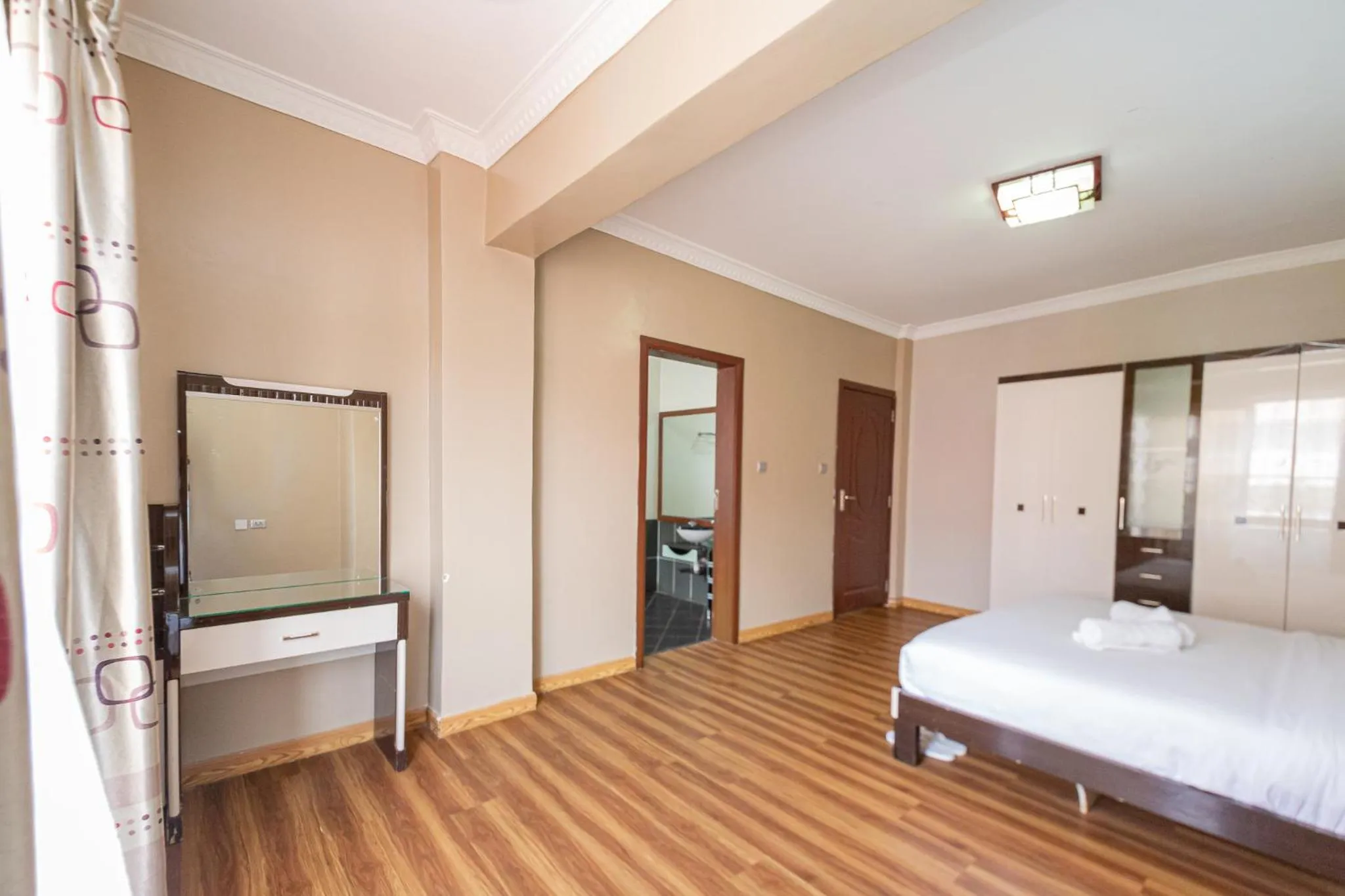 Bed in Eldon Apartments & Suites