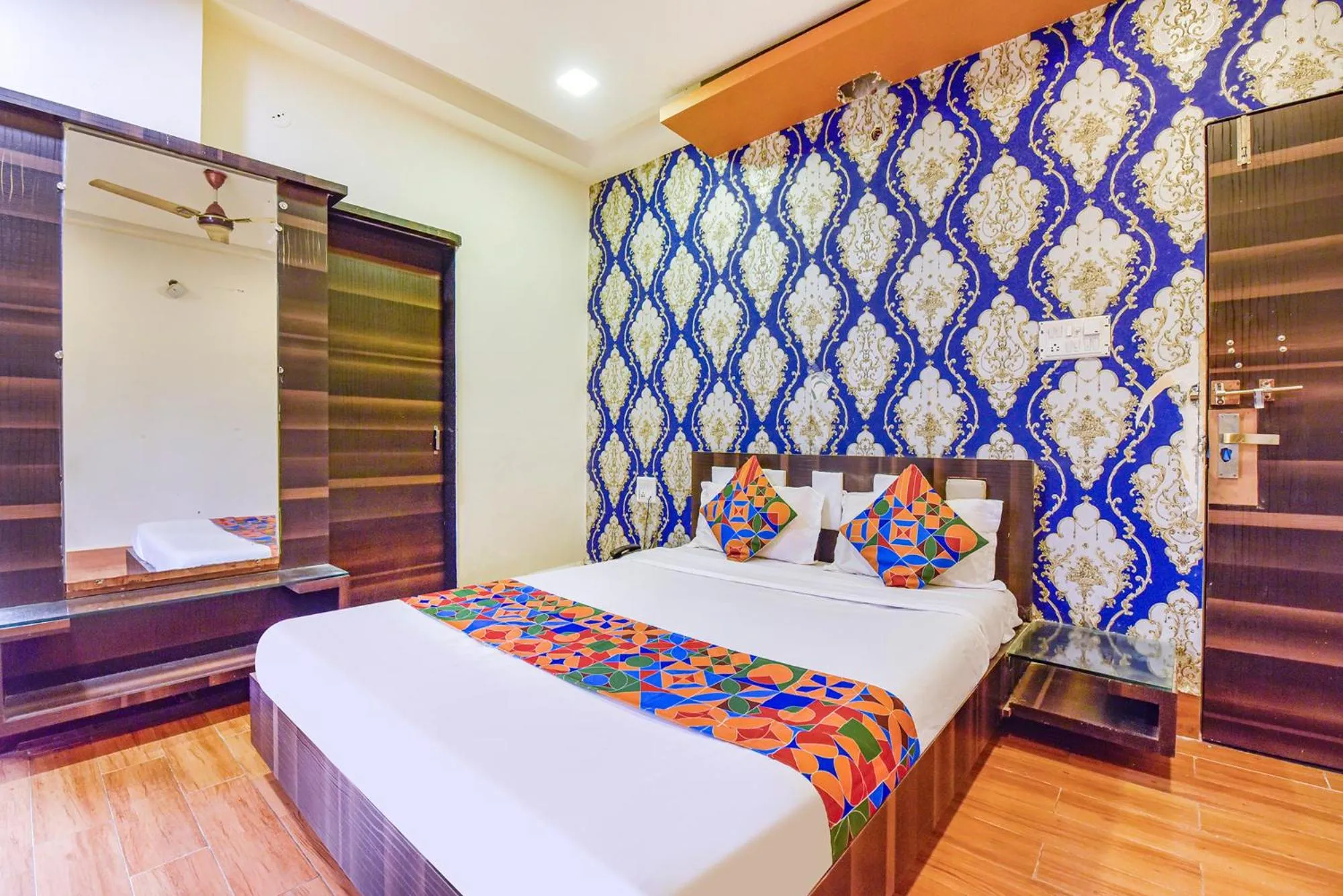 Bed in FabHotel Shri Shyam Palace