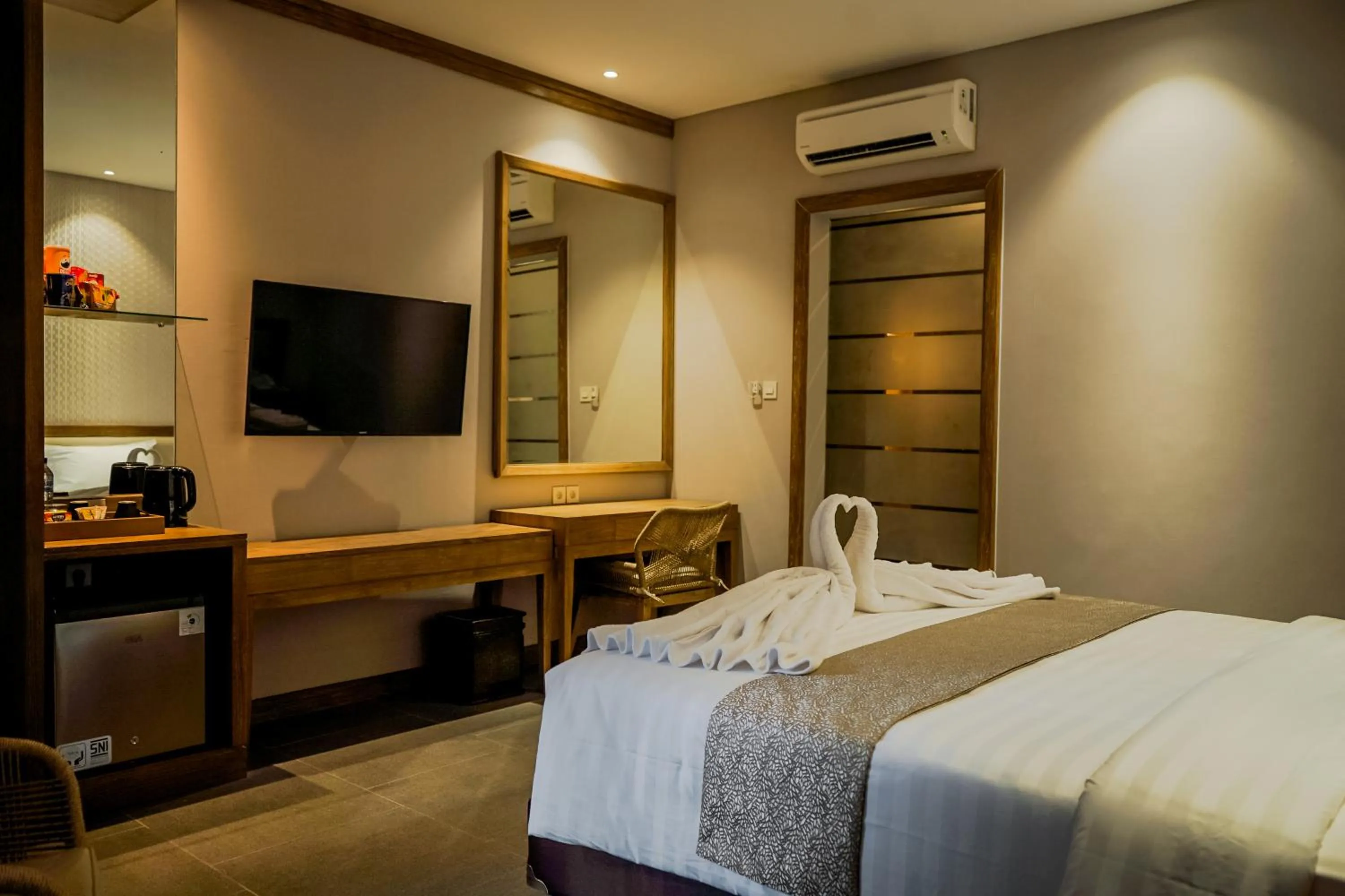 Bed in Tabebuya Resto & Resort