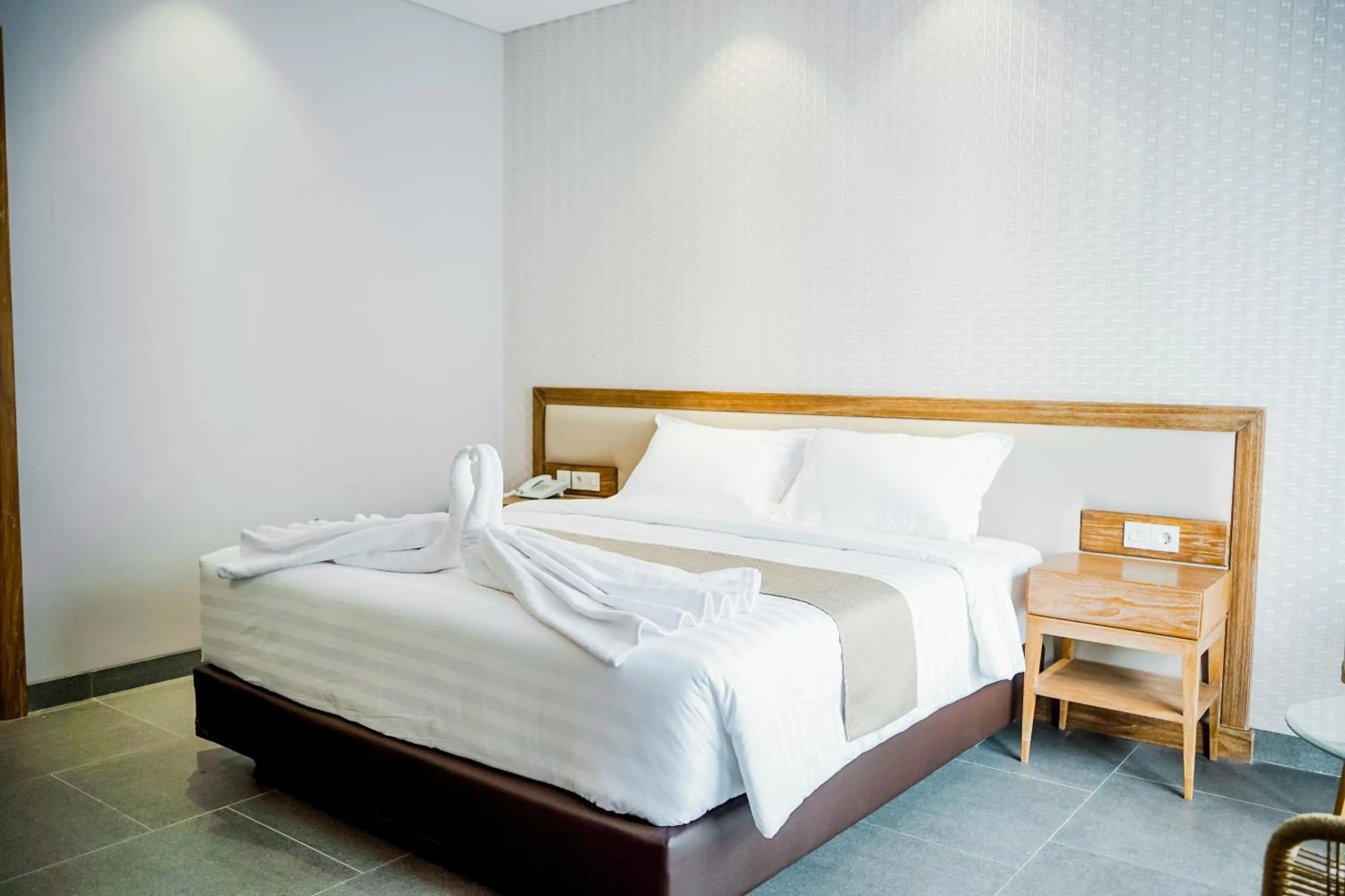 Bed in Tabebuya Resto & Resort