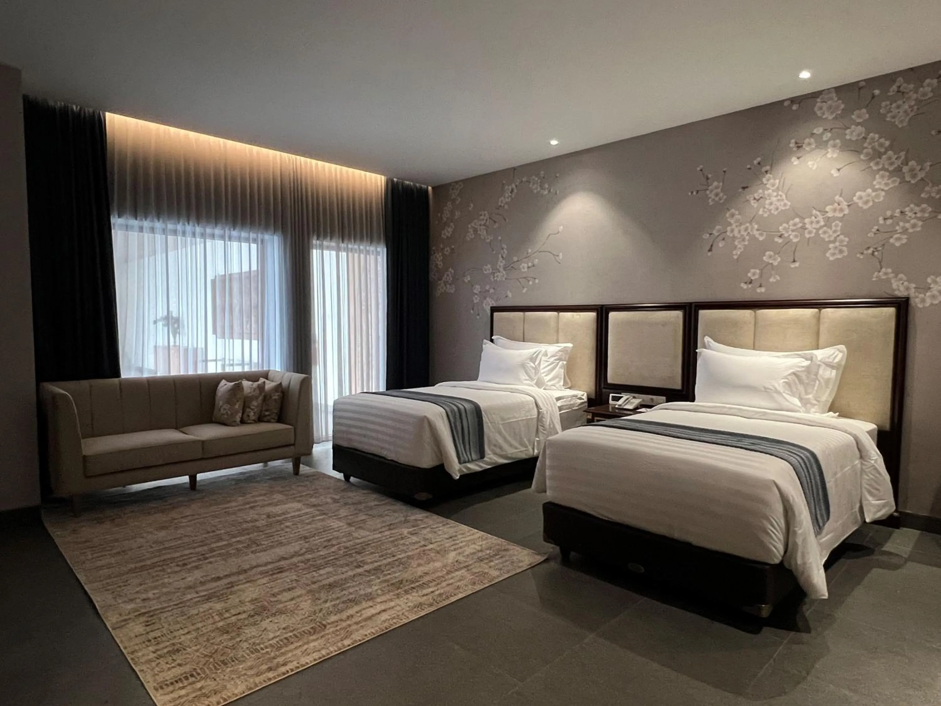 Bed in Tabebuya Resto & Resort